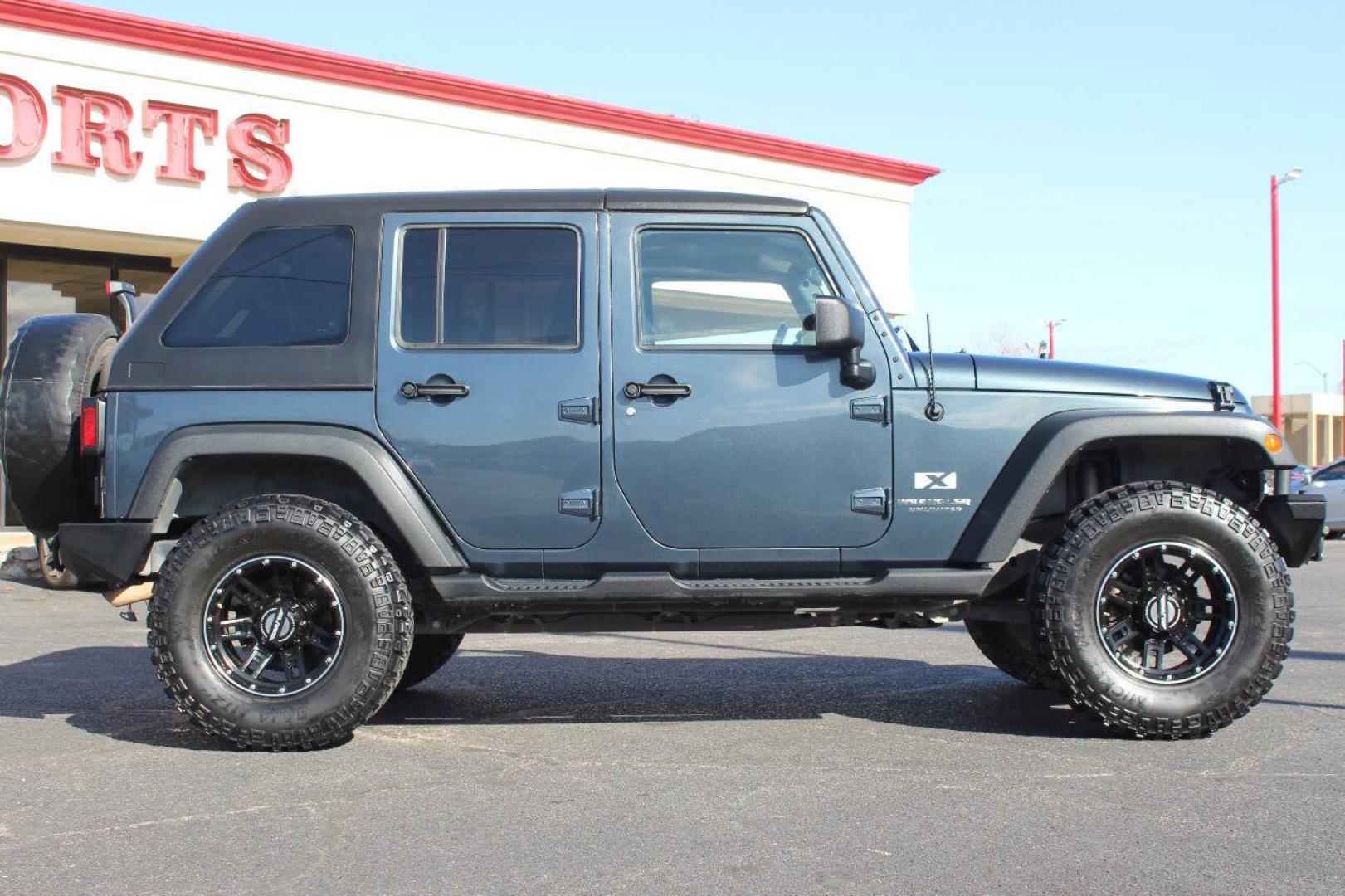 2008 Gray Jeep Wrangler Unlimited Unlimited X 4WD (1J4GA39138L) with an 3.8L V6 3.8L V6 engine, Automatic 4-Speed transmission, located at 4301 NW 39th , Oklahoma City, OK, 73112, (405) 949-5600, 35.512135, -97.598671 - NO DRIVERS LICENCE -NO FULL COVERAGE INSURANCE - NO CREDIT CHECK. COME ON OVER TO SUPERSPORTS, TAKE A LOOK AND TEST DRIVE. PLEASE GIVE US A CALL AT (405) 949-5600. NO LICENCIA DE CONDUCIR - NO SEGURO DE COBERTURA TOTAL - NO VERIFICACION DE CREDITO. VISITENOS EN SUPERSPORTS, MIRE NUESTRO- Photo#2
