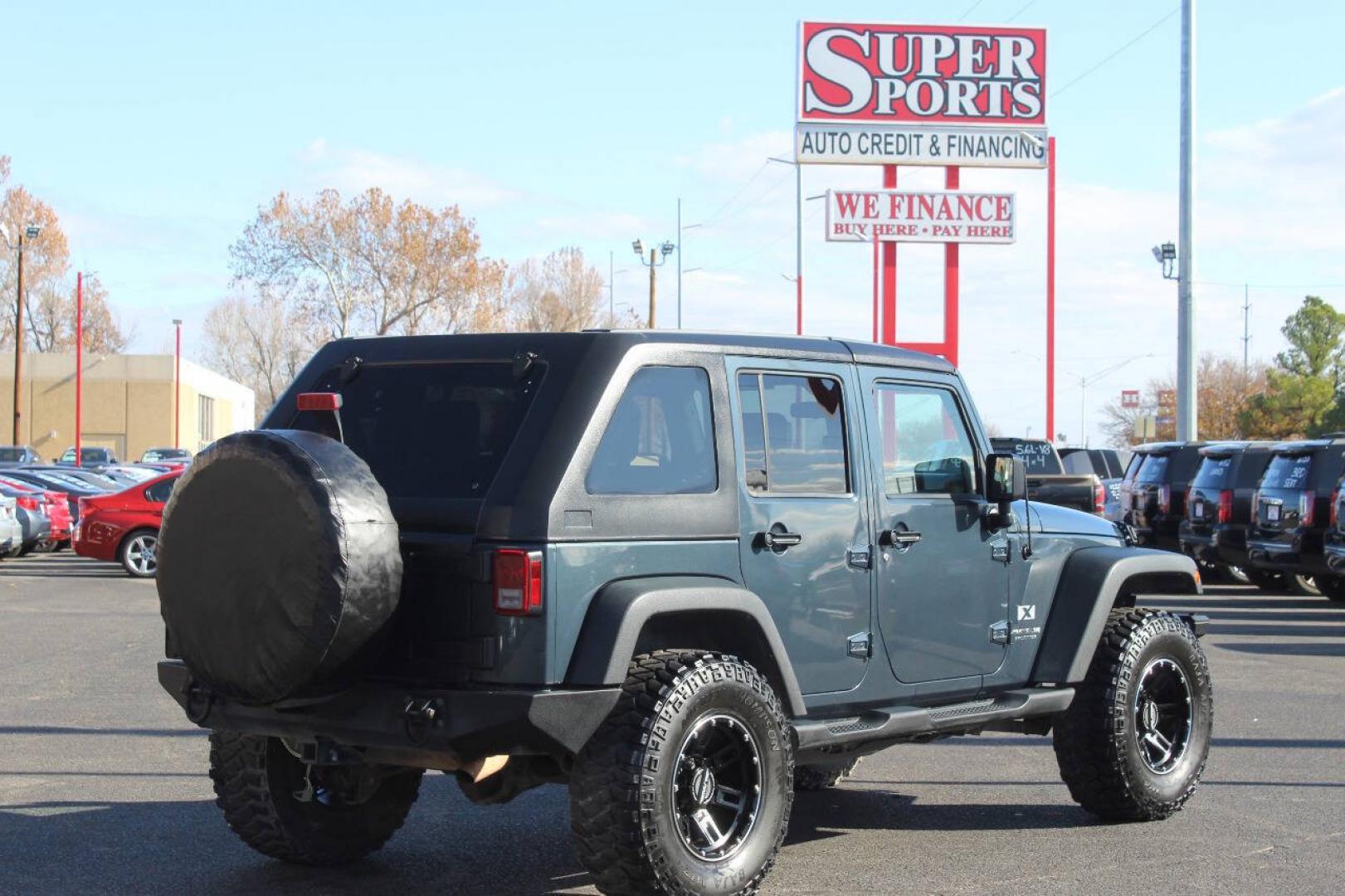 2008 Gray Jeep Wrangler Unlimited Unlimited X 4WD (1J4GA39138L) with an 3.8L V6 3.8L V6 engine, Automatic 4-Speed transmission, located at 4301 NW 39th , Oklahoma City, OK, 73112, (405) 949-5600, 35.512135, -97.598671 - NO DRIVERS LICENCE -NO FULL COVERAGE INSURANCE - NO CREDIT CHECK. COME ON OVER TO SUPERSPORTS, TAKE A LOOK AND TEST DRIVE. PLEASE GIVE US A CALL AT (405) 949-5600. NO LICENCIA DE CONDUCIR - NO SEGURO DE COBERTURA TOTAL - NO VERIFICACION DE CREDITO. VISITENOS EN SUPERSPORTS, MIRE NUESTRO- Photo#3
