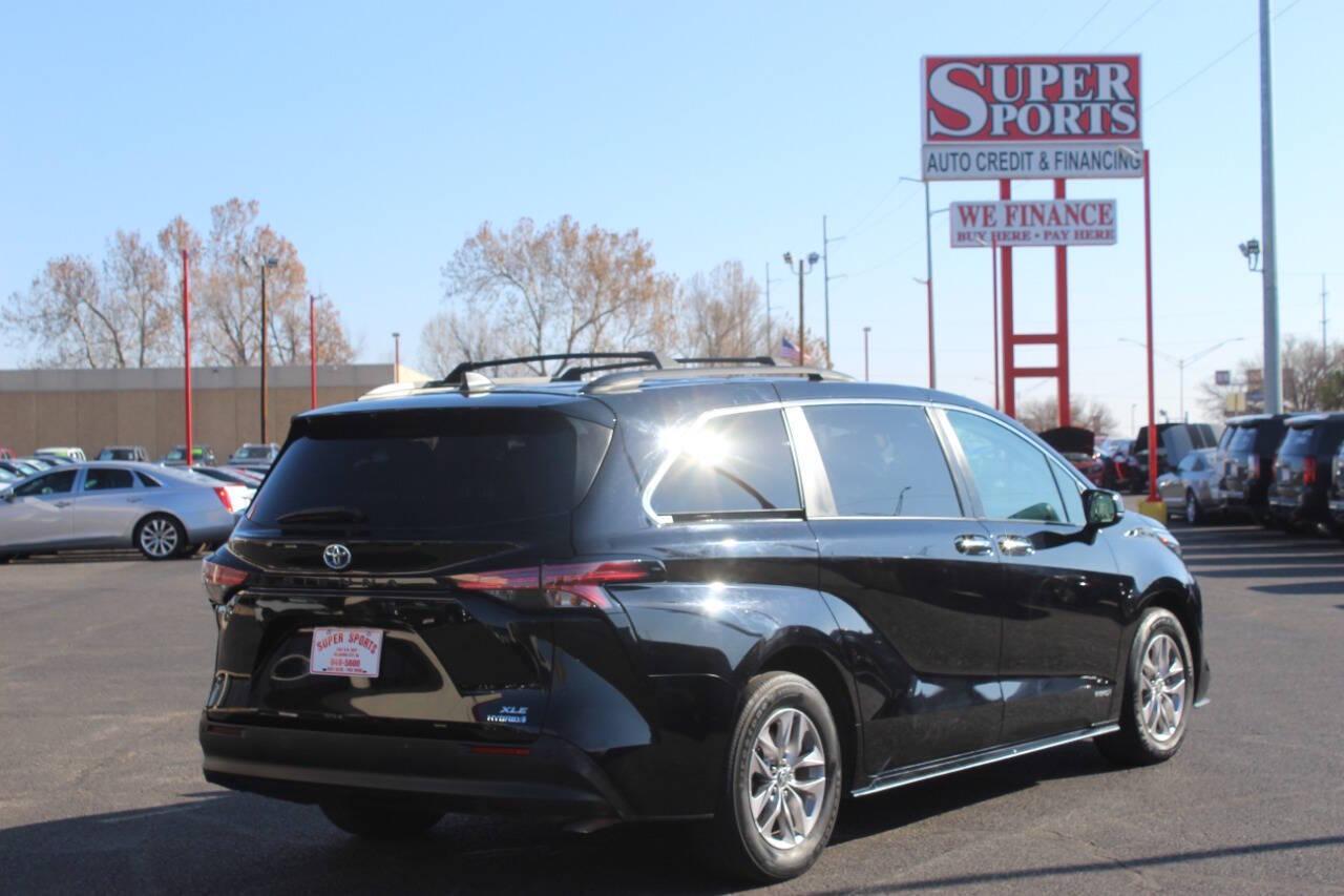 2021 Black Toyota Sienna XLE 7-Passenger (5TDYRKEC5MS) with an 2.5L L4 DOHC 16V HYBRID engine, CVT transmission, located at 4301 NW 39th , Oklahoma City, OK, 73112, (405) 949-5600, 35.512135, -97.598671 - NO DRIVERS LICENCE -NO FULL COVERAGE INSURANCE - NO CREDIT CHECK. COME ON OVER TO SUPERSPORTS, TAKE A LOOK AND TEST DRIVE. PLEASE GIVE US A CALL AT (405) 949-5600. NO LICENCIA DE CONDUCIR - NO SEGURO DE COBERTURA TOTAL - NO VERIFICACION DE CREDITO. VISITENOS EN SUPERSPORTS, MIRE NUESTRO - Photo#3