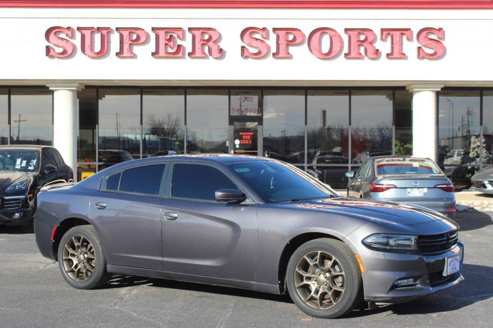 2015 Gray Dodge Charger SXT AWD (2C3CDXJG2FH) with an 3.6L V6 DOHC 24V engine, 8-Speed Automatic transmission, located at 4301 NW 39th , Oklahoma City, OK, 73112, (405) 949-5600, 35.512135, -97.598671 - NO DRIVERS LICENCE NO-FULL COVERAGE INSURANCE-NO CREDIT CHECK. COME ON OVER TO SUPERSPORTS AND TAKE A LOOK AND TEST DRIVE. PLEASE GIVE US A CALL AT (405) 949-5600. NO LICENSIA DE MANEJAR- NO SEGURO DE COBERTURA TOTAL- NO VERIFICACCION DE CREDITO. POR FAVOR VENGAN A SUPERSPORTS, ECHE U - Photo#0