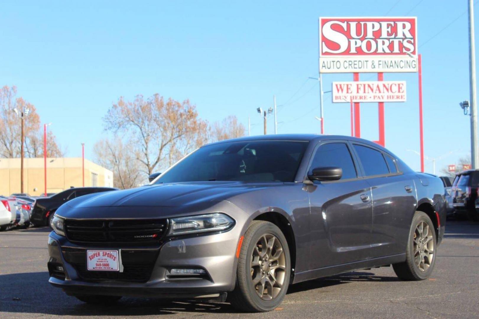 2015 Gray Dodge Charger SXT AWD (2C3CDXJG2FH) with an 3.6L V6 DOHC 24V engine, 8-Speed Automatic transmission, located at 4301 NW 39th , Oklahoma City, OK, 73112, (405) 949-5600, 35.512135, -97.598671 - NO DRIVERS LICENCE NO-FULL COVERAGE INSURANCE-NO CREDIT CHECK. COME ON OVER TO SUPERSPORTS AND TAKE A LOOK AND TEST DRIVE. PLEASE GIVE US A CALL AT (405) 949-5600. NO LICENSIA DE MANEJAR- NO SEGURO DE COBERTURA TOTAL- NO VERIFICACCION DE CREDITO. POR FAVOR VENGAN A SUPERSPORTS, ECHE U - Photo#6