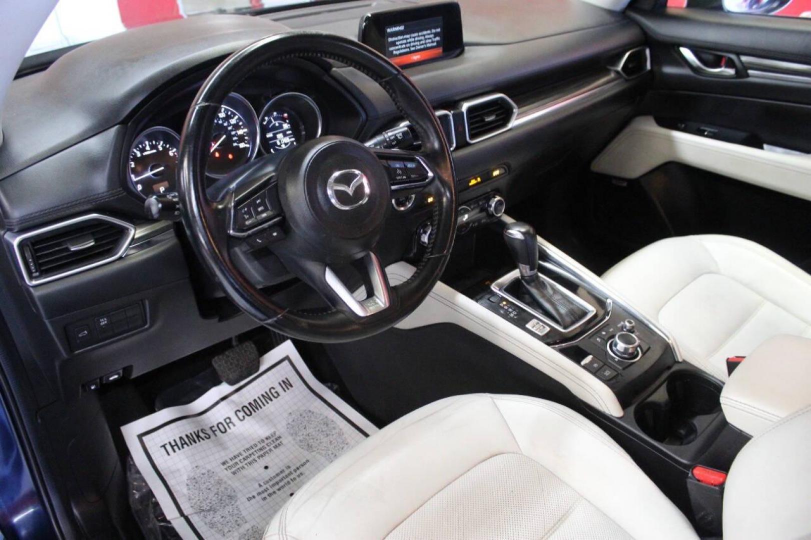 2017 Blue Mazda CX-5 Grand Touring (JM3KFADLXH0) with an 2.5L L4 DOHC 16V engine, 6A transmission, located at 4301 NW 39th , Oklahoma City, OK, 73112, (405) 949-5600, 35.512135, -97.598671 - NO DRIVERS LICENCE NO-FULL COVERAGE INSURANCE-NO CREDIT CHECK. COME ON OVER TO SUPERSPORTS AND TAKE A LOOK AND TEST DRIVE. PLEASE GIVE US A CALL AT (405) 949-5600. NO LICENSIA DE MANEJAR- NO SEGURO DE COBERTURA TOTAL- NO VERIFICACCION DE CREDITO. POR FAVOR VENGAN A SUPERSPORTS, ECHE U - Photo#17