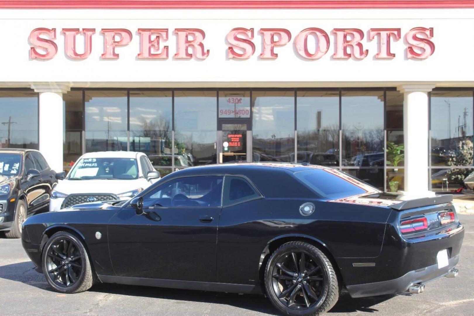 2018 Black Dodge Challenger SXT (2C3CDZAG8JH) with an 3.6L V6 DOHC 24V engine, 8A transmission, located at 4301 NW 39th , Oklahoma City, OK, 73112, (405) 949-5600, 35.512135, -97.598671 - NO DRIVERS LICENCE NO-FULL COVERAGE INSURANCE-NO CREDIT CHECK. COME ON OVER TO SUPERSPORTS AND TAKE A LOOK AND TEST DRIVE. PLEASE GIVE US A CALL AT (405) 949-5600. NO LICENSIA DE MANEJAR- NO SEGURO DE COBERTURA TOTAL- NO VERIFICACCION DE CREDITO. POR FAVOR VENGAN A SUPERSPORTS, ECHE UN - Photo#4