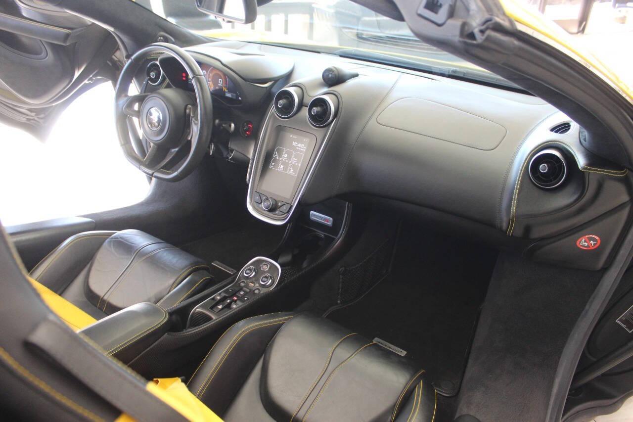 2018 Yellow McLaren 570s Spider (SBM13FAA2JW) with an 3.8L V8 TURBO engine, 7A transmission, located at 4301 NW 39th , Oklahoma City, OK, 73112, (405) 949-5600, 35.512135, -97.598671 - PERSONAL VEHICLE LAST FEW YEARS. IT'S ONE OF THE OWNER'S WIFE'S FEW POSSESSIONS THAT ARE CONSIDERED TOYS, IT LOOKS AND DRIVES LIKE IT'S BRAND NEW, IT'S A MUST SEE. My name is Josh, and I own dealerships and finance companies here in Oklahoma. I have 27 years of experience buying and selling al - Photo#10