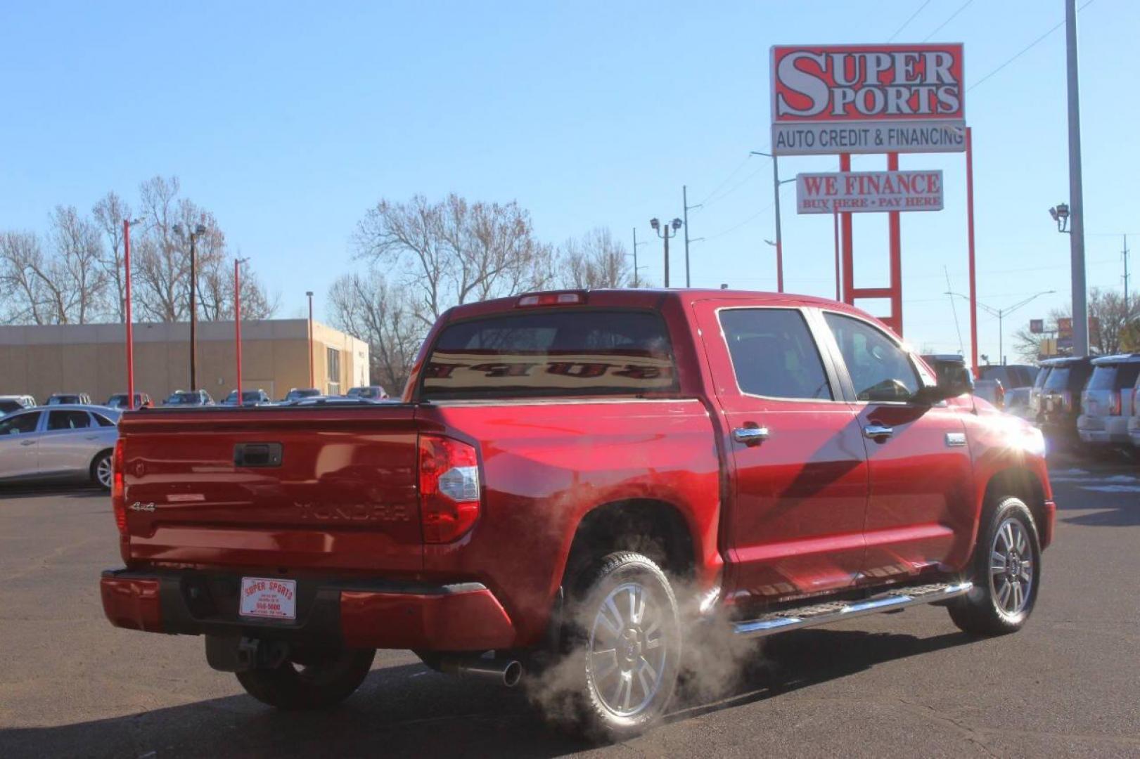 2017 Red Toyota Tundra Platinum CrewMax 5.7L FFV 4WD (5TFAW5F19HX) with an 5.7L V8 DOHC 32V engine, 6A transmission, located at 4301 NW 39th , Oklahoma City, OK, 73112, (405) 949-5600, 35.512135, -97.598671 - NO DRIVERS LICENCE NO-FULL COVERAGE INSURANCE-NO CREDIT CHECK. COME ON OVER TO SUPERSPORTS AND TAKE A LOOK AND TEST DRIVE. PLEASE GIVE US A CALL AT (405) 949-5600. NO LICENSIA DE MANEJAR- NO SEGURO DE COBERTURA TOTAL- NO VERIFICACCION DE CREDITO. POR FAVOR VENGAN A SUPERSPORTS, ECHE UN - Photo#3