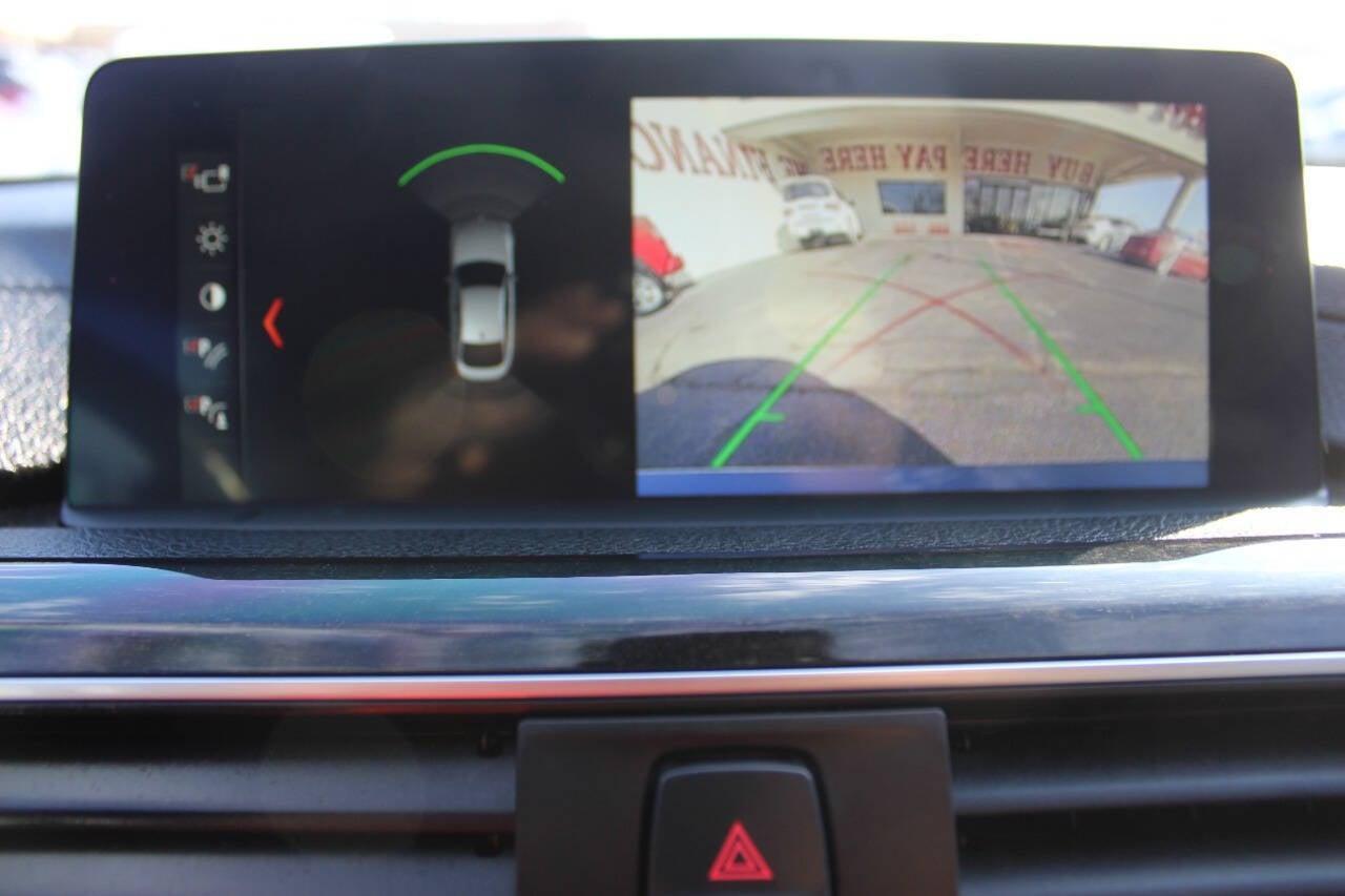 2018 Gray BMW 4 Series 430i xDrive (WBA4J3C56JB) with an 2.0L I4 Turbocharger 2.0L I4 engine, Automatic 8-Speed transmission, located at 4301 NW 39th , Oklahoma City, OK, 73112, (405) 949-5600, 35.512135, -97.598671 - NO DRIVERS LICENCE NO-FULL COVERAGE INSURANCE-NO CREDIT CHECK. COME ON OVER TO SUPERSPORTS AND TAKE A LOOK AND TEST DRIVE. PLEASE GIVE US A CALL AT (405) 949-5600. NO LICENSIA DE MANEJAR- NO SEGURO DE COBERTURA TOTAL- NO VERIFICACCION DE CREDITO. POR FAVOR VENGAN A SUPERSPORTS, ECHE UN - Photo#16