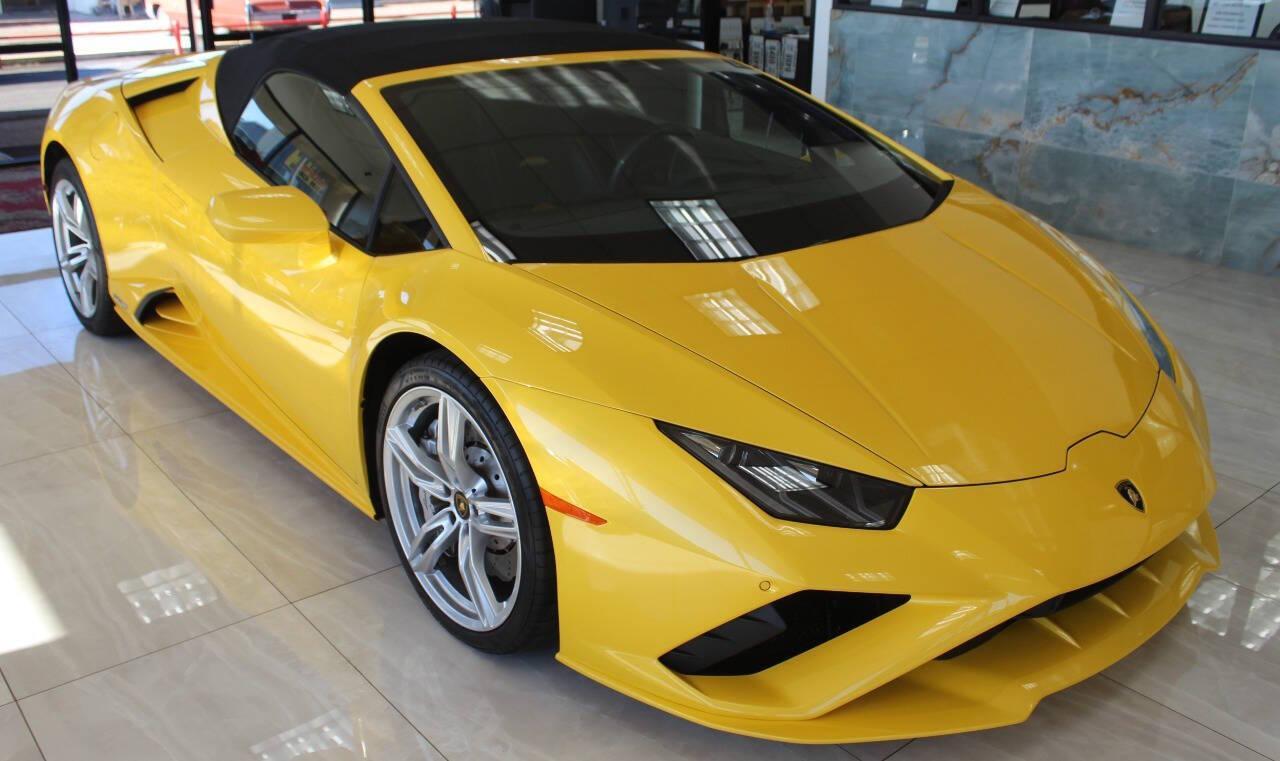 2021 Yellow Lamborghini Huracan EVO Spyder (ZHWUT5ZF0ML) with an 6.5L V12 DOHC 48V engine, 7A transmission, located at 4301 NW 39th , Oklahoma City, OK, 73112, (405) 949-5600, 35.512135, -97.598671 - PERSONAL VEHICLE LAST FEW YEARS. it's one of a wife's few possessions that are considered toys looks and drives brand new its a must see. My name is Josh, and I own dealerships and finance companies here in Oklahoma. I have 27 years of experience buying and selling all makes and models of vehi - Photo#1