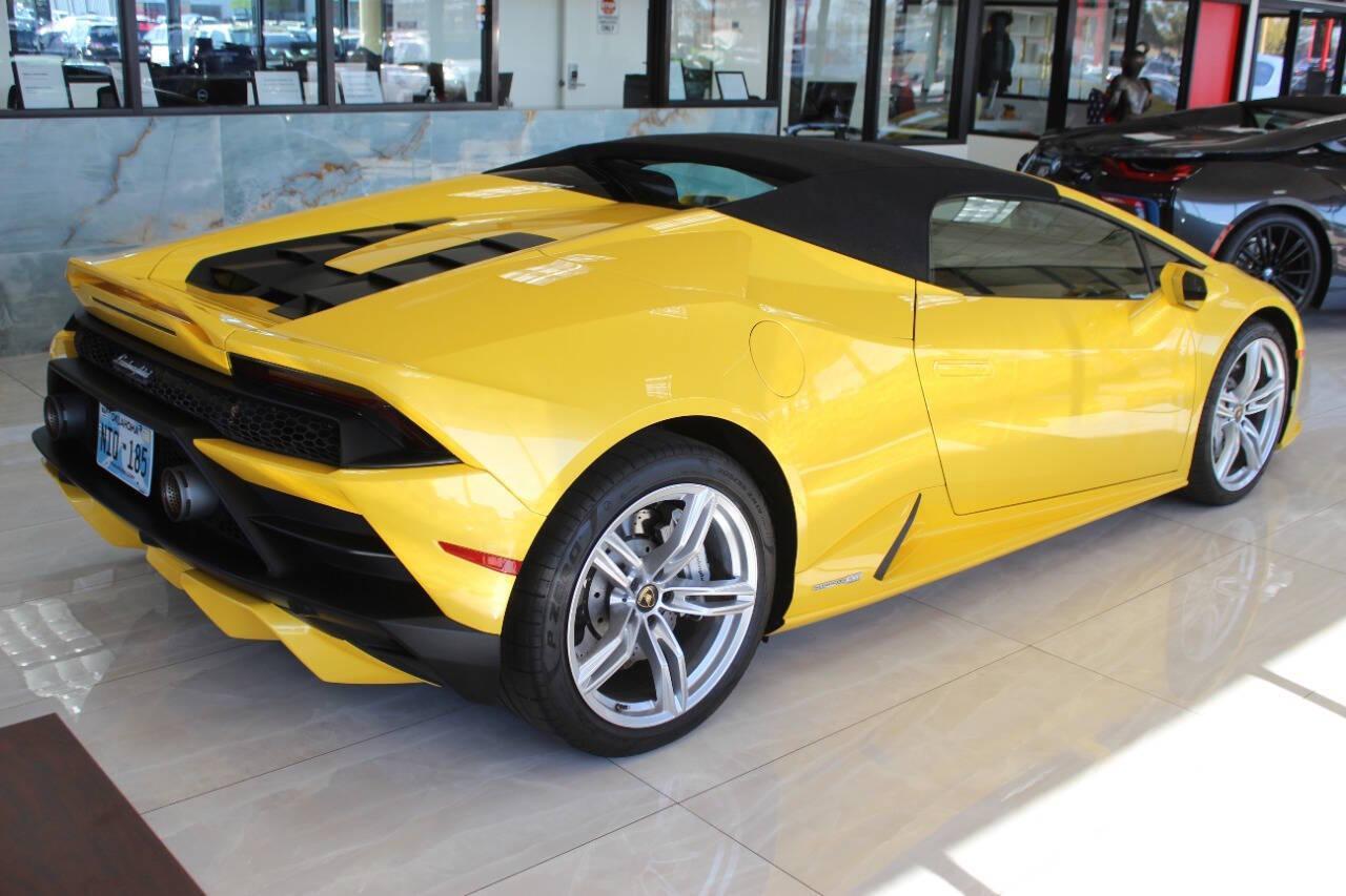 2021 Yellow Lamborghini Huracan EVO Spyder (ZHWUT5ZF0ML) with an 6.5L V12 DOHC 48V engine, 7A transmission, located at 4301 NW 39th , Oklahoma City, OK, 73112, (405) 949-5600, 35.512135, -97.598671 - PERSONAL VEHICLE LAST FEW YEARS. it's one of a wife's few possessions that are considered toys looks and drives brand new its a must see. My name is Josh, and I own dealerships and finance companies here in Oklahoma. I have 27 years of experience buying and selling all makes and models of vehi - Photo#2