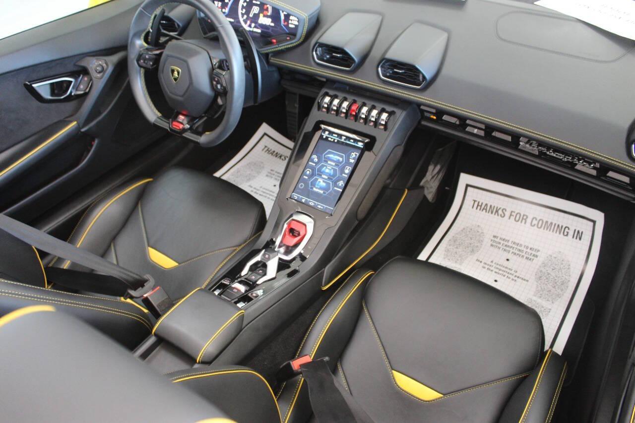 2021 Yellow Lamborghini Huracan EVO Spyder (ZHWUT5ZF0ML) with an 6.5L V12 DOHC 48V engine, 7A transmission, located at 4301 NW 39th , Oklahoma City, OK, 73112, (405) 949-5600, 35.512135, -97.598671 - PERSONAL VEHICLE LAST FEW YEARS. it's one of a wife's few possessions that are considered toys looks and drives brand new its a must see. My name is Josh, and I own dealerships and finance companies here in Oklahoma. I have 27 years of experience buying and selling all makes and models of vehi - Photo#10