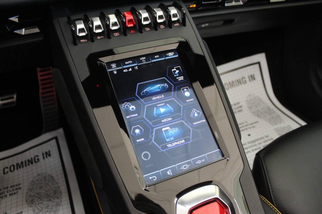 2021 Yellow Lamborghini Huracan EVO Spyder (ZHWUT5ZF0ML) with an 6.5L V12 DOHC 48V engine, 7A transmission, located at 4301 NW 39th , Oklahoma City, OK, 73112, (405) 949-5600, 35.512135, -97.598671 - PERSONAL VEHICLE LAST FEW YEARS. it's one of a wife's few possessions that are considered toys looks and drives brand new its a must see. My name is Josh, and I own dealerships and finance companies here in Oklahoma. I have 27 years of experience buying and selling all makes and models of vehi - Photo#11