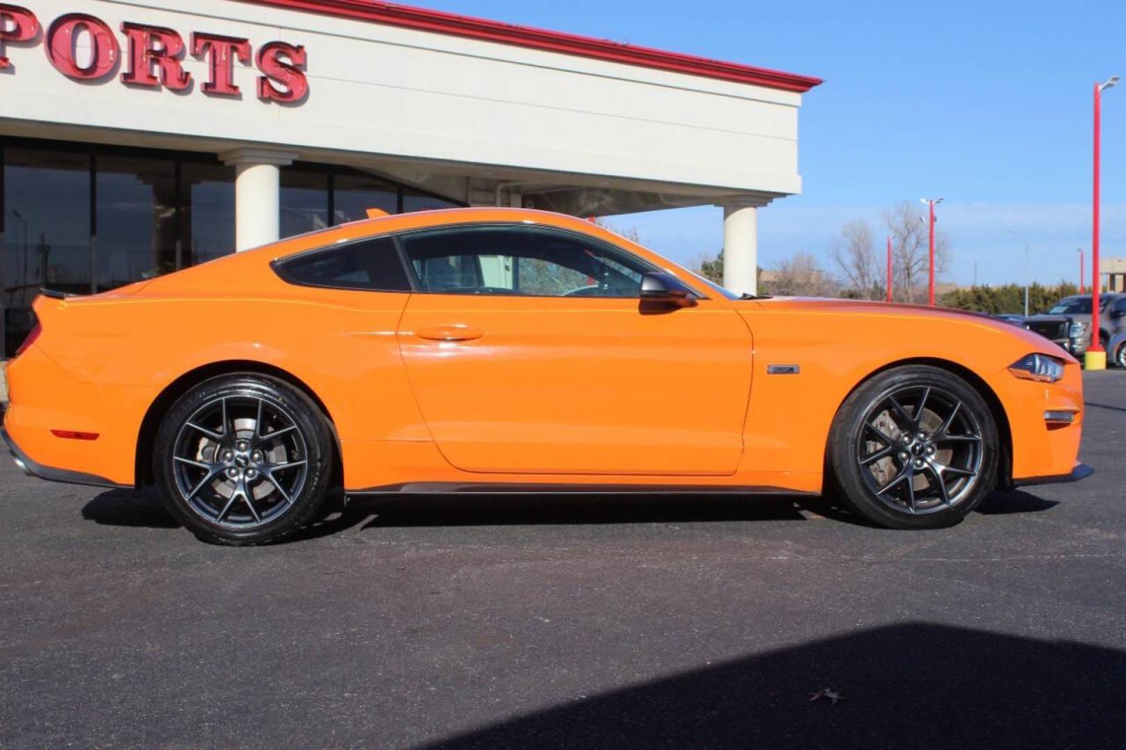 2020 Orange Ford Mustang EcoBoost Coupe (1FA6P8TD6L5) with an 2.3L L4 DOHC 16V engine, Automatic 10-Speed transmission, located at 4301 NW 39th , Oklahoma City, OK, 73112, (405) 949-5600, 35.512135, -97.598671 - Photo#2