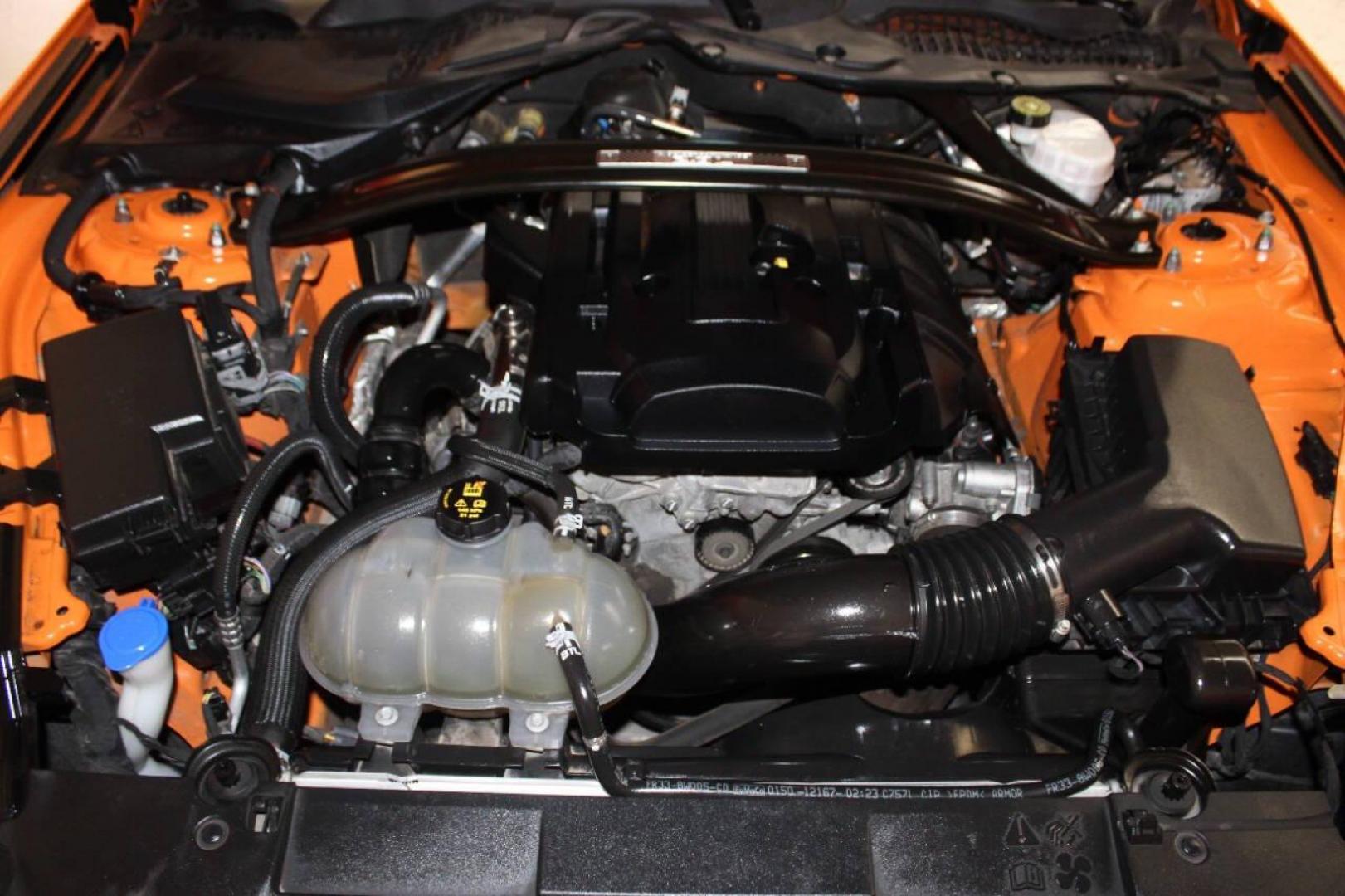 2020 Orange Ford Mustang EcoBoost Coupe (1FA6P8TD6L5) with an 2.3L L4 DOHC 16V engine, Automatic 10-Speed transmission, located at 4301 NW 39th , Oklahoma City, OK, 73112, (405) 949-5600, 35.512135, -97.598671 - Photo#7