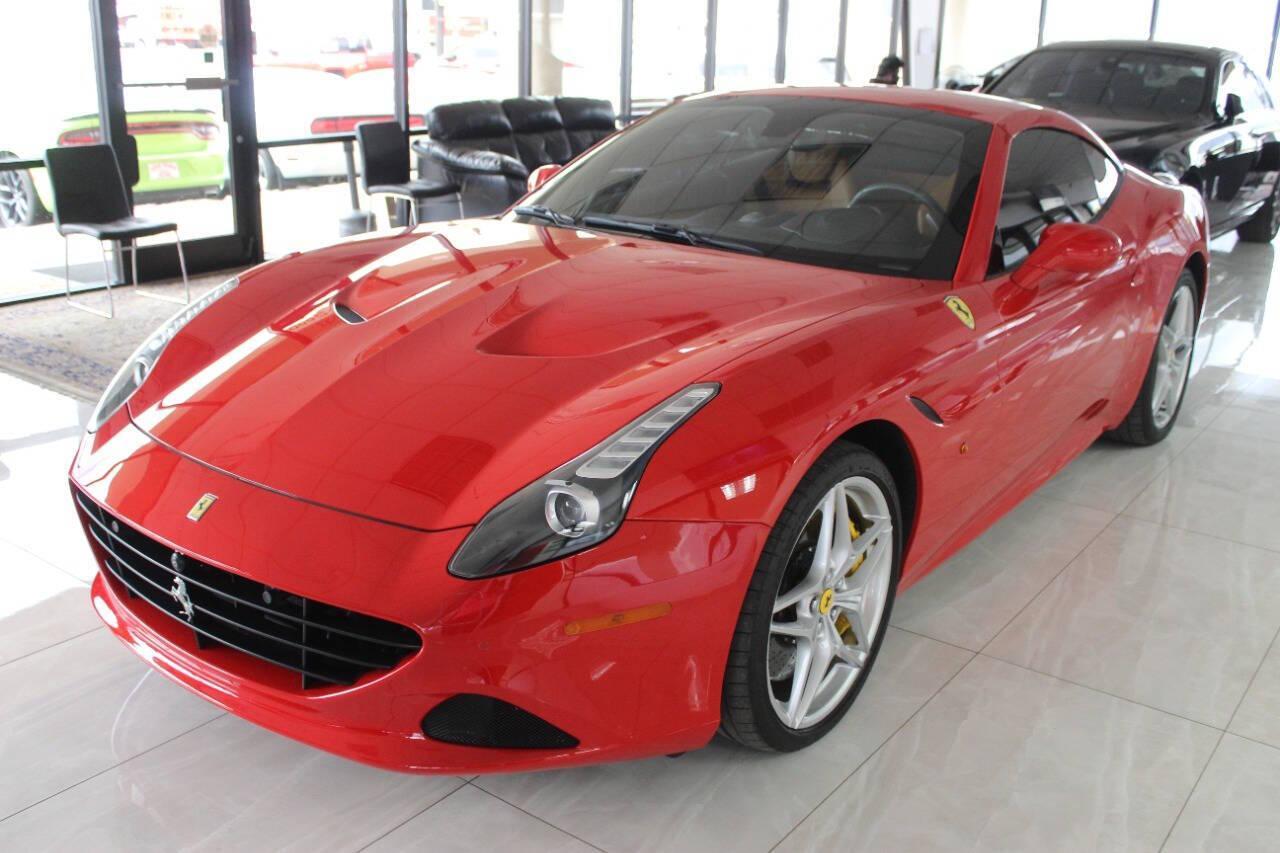 2016 Red Ferrari California Convertible T (ZFF77XJA9G0) with an 3.9L V8 DOHC 32V engine, 7A transmission, located at 4301 NW 39th , Oklahoma City, OK, 73112, (405) 949-5600, 35.512135, -97.598671 - Rare combo: red exterior and tan interior. Fully functional. PERSONAL VEHICLE LAST FEW YEARS SINCE 2017 . IT'S ONE OF THE OWNER'S WIFE'S FEW POSSESSIONS THAT ARE CONSIDERED TOYS, IT LOOKS AND DRIVES LIKE new, IT'S A MUST SEE for this price. ..... small crack on the windshield..... My na - Photo#0