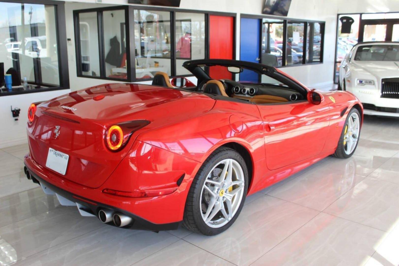 2016 Red Ferrari California Convertible T (ZFF77XJA9G0) with an 3.9L V8 DOHC 32V engine, 7A transmission, located at 4301 NW 39th , Oklahoma City, OK, 73112, (405) 949-5600, 35.512135, -97.598671 - PERSONAL VEHICLE LAST FEW YEARS. IT'S ONE OF THE OWNER'S WIFE'S FEW POSSESSIONS THAT ARE CONSIDERED TOYS, IT LOOKS AND DRIVES LIKE IT'S BRAND NEW, IT'S A MUST SEE. NEW TIRES, FRESH OIL CHANGE, NEW BATTERY. small crack on windshield. TEXT FIRST. COME ON OVER TO SUPERSPORTS AND TAKE A LOOK AND - Photo#7