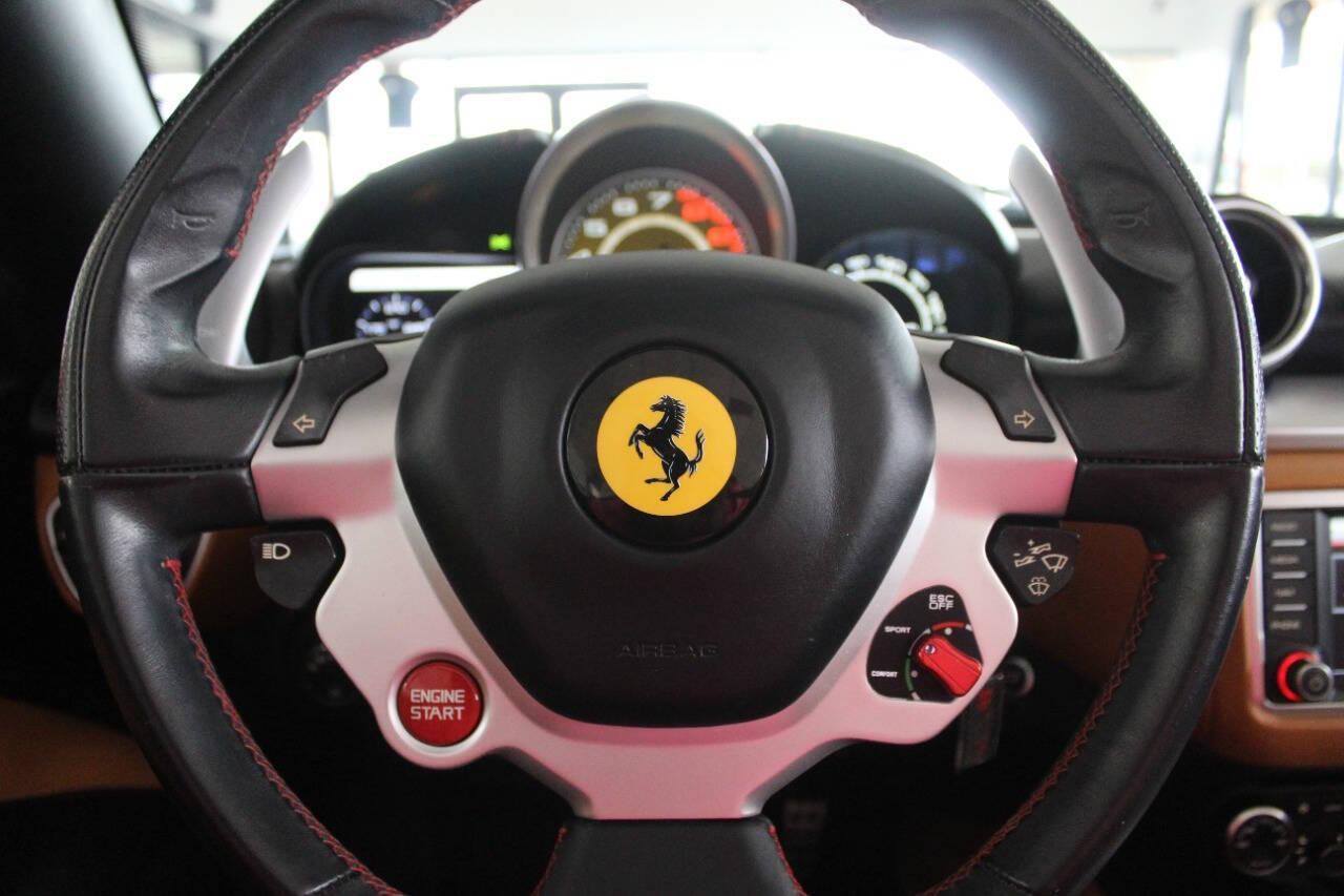 2016 Red Ferrari California Convertible T (ZFF77XJA9G0) with an 3.9L V8 DOHC 32V engine, 7A transmission, located at 4301 NW 39th , Oklahoma City, OK, 73112, (405) 949-5600, 35.512135, -97.598671 - Rare combo: red exterior and tan interior. Fully functional. PERSONAL VEHICLE LAST FEW YEARS SINCE 2017 . IT'S ONE OF THE OWNER'S WIFE'S FEW POSSESSIONS THAT ARE CONSIDERED TOYS, IT LOOKS AND DRIVES LIKE new, IT'S A MUST SEE for this price. ..... small crack on the windshield..... My na - Photo#16