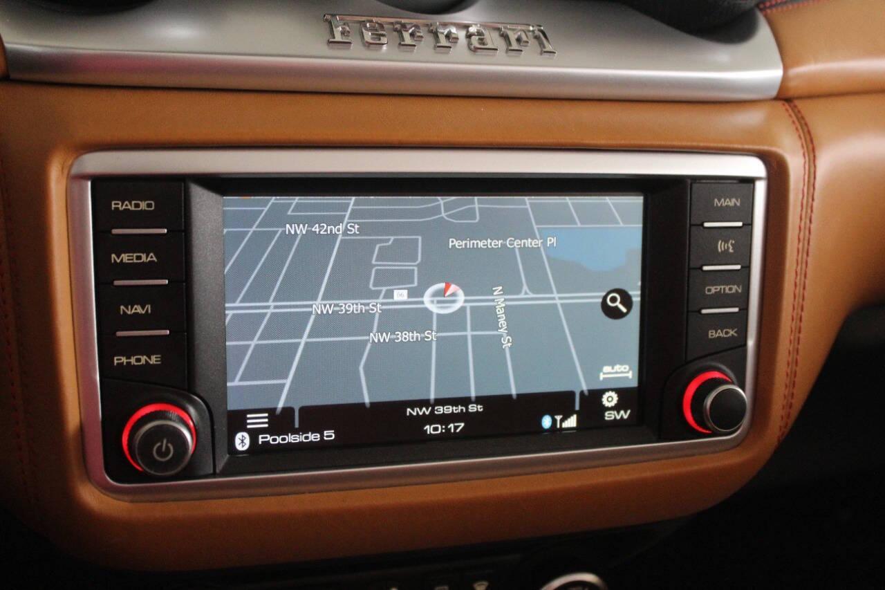 2016 Red Ferrari California Convertible T (ZFF77XJA9G0) with an 3.9L V8 DOHC 32V engine, 7A transmission, located at 4301 NW 39th , Oklahoma City, OK, 73112, (405) 949-5600, 35.512135, -97.598671 - Rare combo: red exterior and tan interior. Fully functional. PERSONAL VEHICLE LAST FEW YEARS SINCE 2017 . IT'S ONE OF THE OWNER'S WIFE'S FEW POSSESSIONS THAT ARE CONSIDERED TOYS, IT LOOKS AND DRIVES LIKE new, IT'S A MUST SEE for this price. ..... small crack on the windshield..... My na - Photo#18