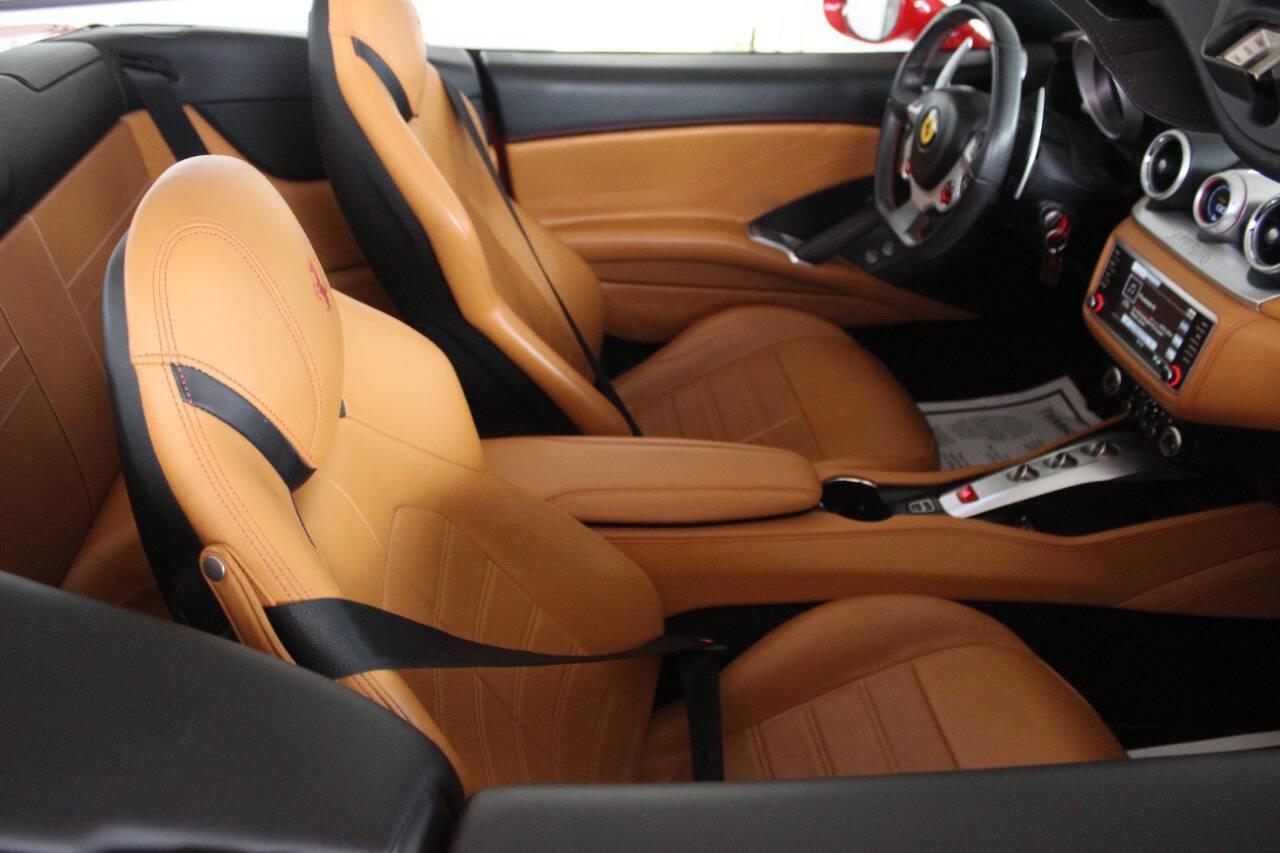 2016 Red Ferrari California Convertible T (ZFF77XJA9G0) with an 3.9L V8 DOHC 32V engine, 7A transmission, located at 4301 NW 39th , Oklahoma City, OK, 73112, (405) 949-5600, 35.512135, -97.598671 - Rare combo: red exterior and tan interior. Fully functional. PERSONAL VEHICLE LAST FEW YEARS SINCE 2017 . IT'S ONE OF THE OWNER'S WIFE'S FEW POSSESSIONS THAT ARE CONSIDERED TOYS, IT LOOKS AND DRIVES LIKE new, IT'S A MUST SEE for this price. ..... small crack on the windshield..... My na - Photo#21