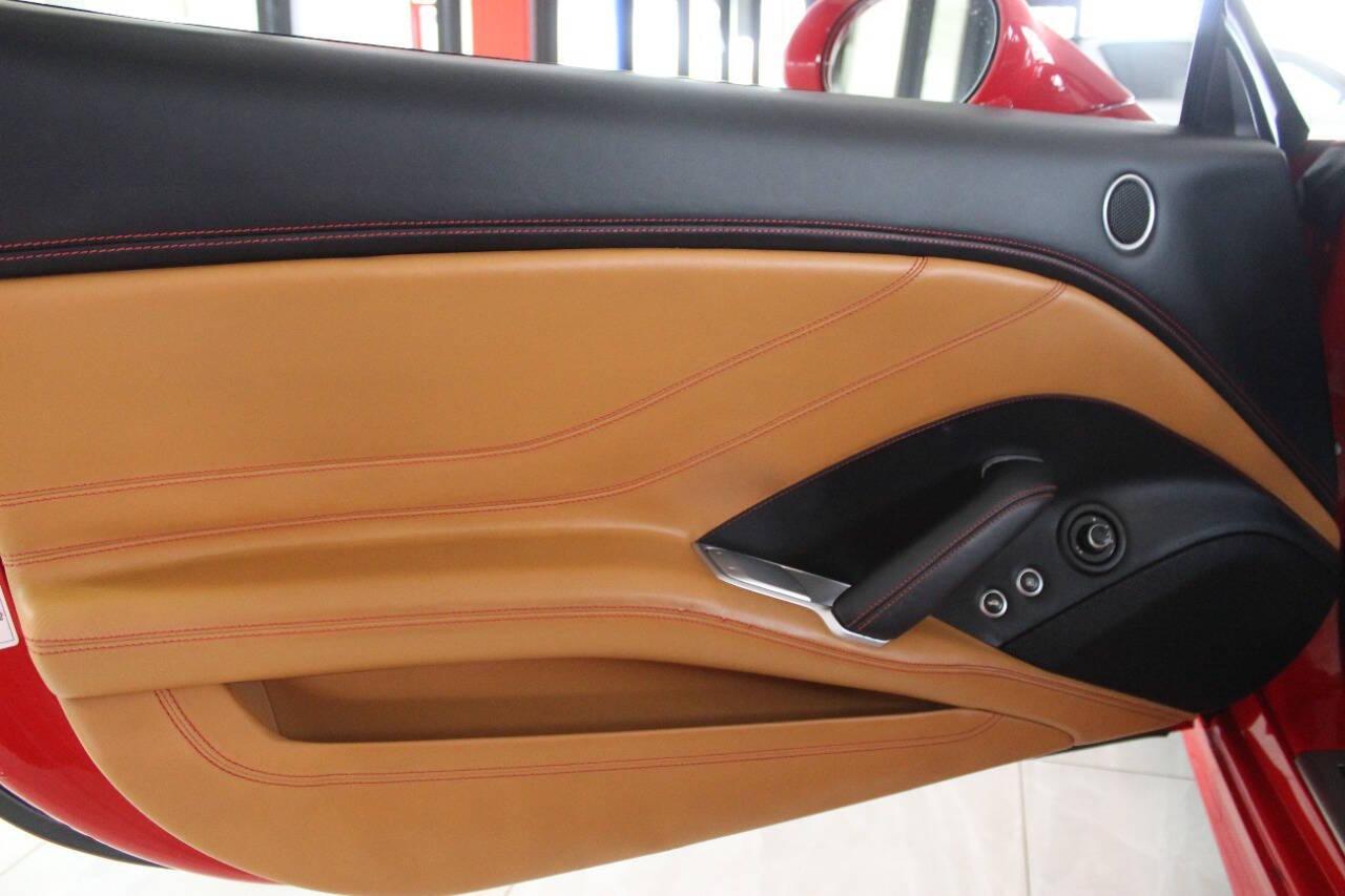 2016 Red Ferrari California Convertible T (ZFF77XJA9G0) with an 3.9L V8 DOHC 32V engine, 7A transmission, located at 4301 NW 39th , Oklahoma City, OK, 73112, (405) 949-5600, 35.512135, -97.598671 - Rare combo: red exterior and tan interior. Fully functional. PERSONAL VEHICLE LAST FEW YEARS SINCE 2017 . IT'S ONE OF THE OWNER'S WIFE'S FEW POSSESSIONS THAT ARE CONSIDERED TOYS, IT LOOKS AND DRIVES LIKE new, IT'S A MUST SEE for this price. ..... small crack on the windshield..... My na - Photo#23