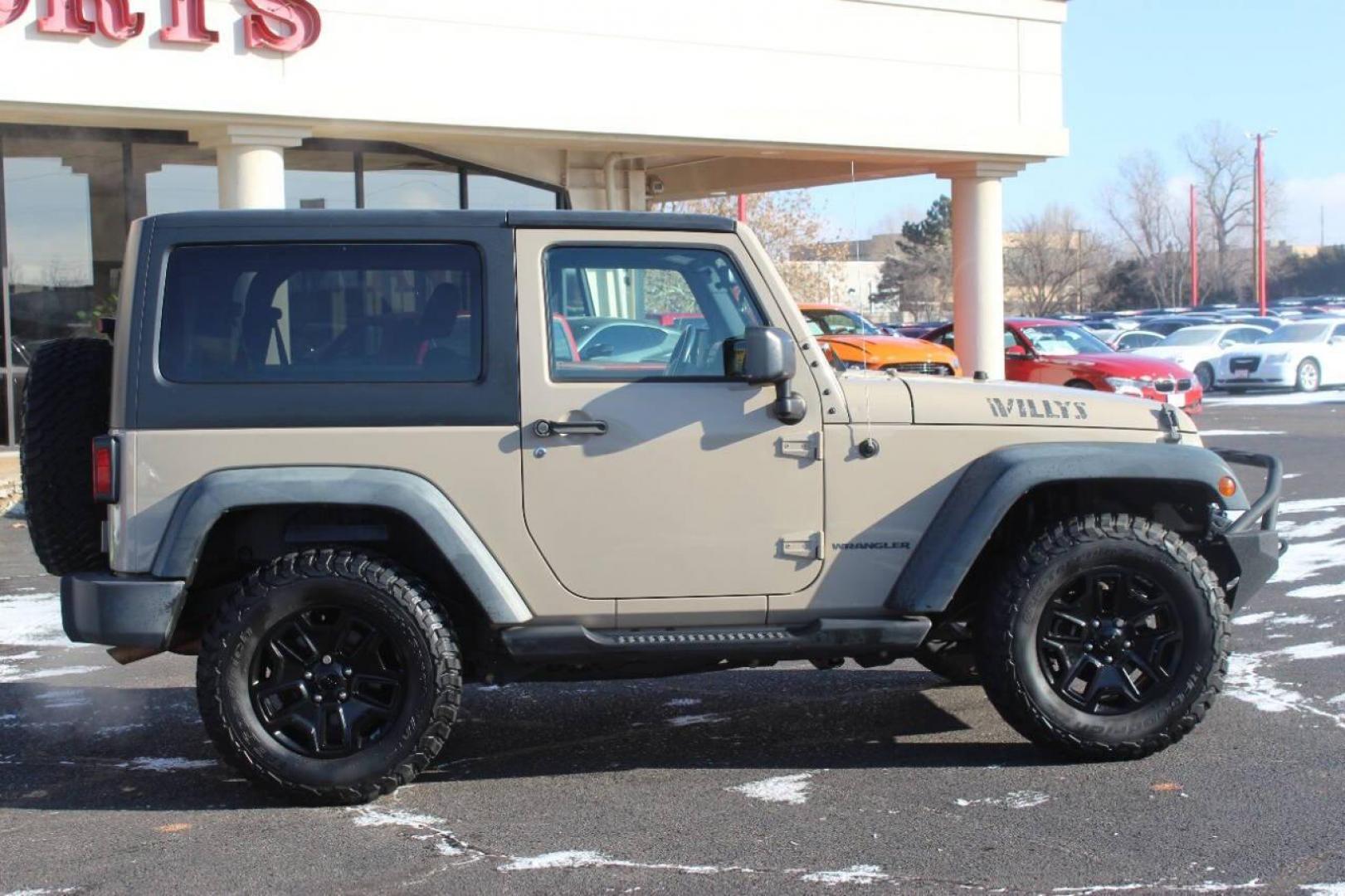 2016 Tan Jeep Wrangler Sport 4WD (1C4AJWAG7GL) with an 3.6L V6 DOHC 24V FFV engine, Automatic 5-Speed transmission, located at 4301 NW 39th , Oklahoma City, OK, 73112, (405) 949-5600, 35.512135, -97.598671 - NO DRIVERS LICENCE -NO FULL COVERAGE INSURANCE - NO CREDIT CHECK. COME ON OVER TO SUPERSPORTS, TAKE A LOOK AND TEST DRIVE. PLEASE GIVE US A CALL AT (405) 949-5600. NO LICENCIA DE CONDUCIR - NO SEGURO DE COBERTURA TOTAL - NO VERIFICACION DE CREDITO. VISITENOS EN SUPERSPORTS, MIRE NUESTRO - Photo#3