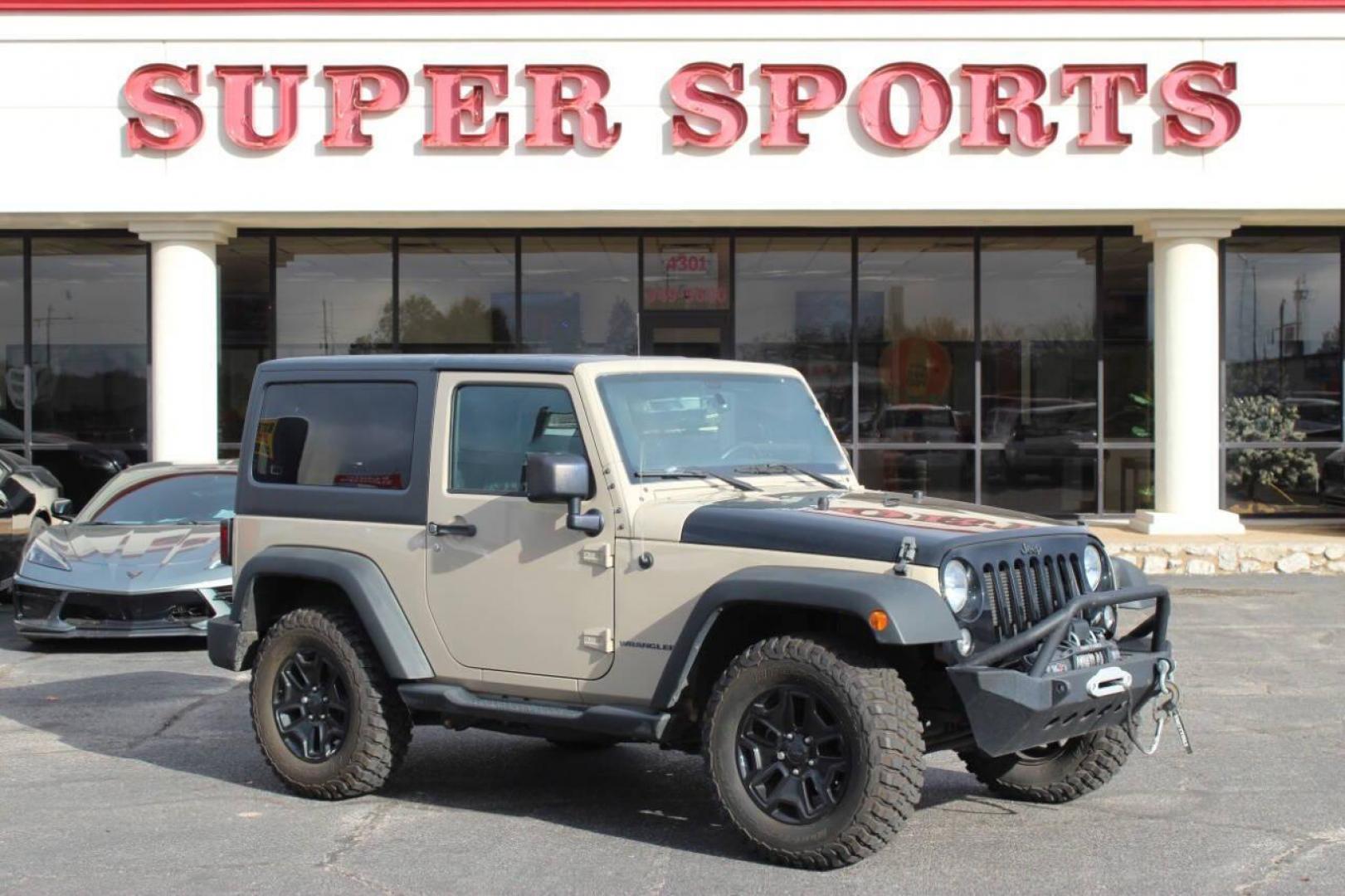 2016 Tan Jeep Wrangler Sport 4WD (1C4AJWAG7GL) with an 3.6L V6 DOHC 24V FFV engine, Automatic 5-Speed transmission, located at 4301 NW 39th , Oklahoma City, OK, 73112, (405) 949-5600, 35.512135, -97.598671 - NO DRIVERS LICENCE -NO FULL COVERAGE INSURANCE - NO CREDIT CHECK. COME ON OVER TO SUPERSPORTS, TAKE A LOOK AND TEST DRIVE. PLEASE GIVE US A CALL AT (405) 949-5600. NO LICENCIA DE CONDUCIR - NO SEGURO DE COBERTURA TOTAL - NO VERIFICACION DE CREDITO. VISITENOS EN SUPERSPORTS, MIRE NUESTRO - Photo#0