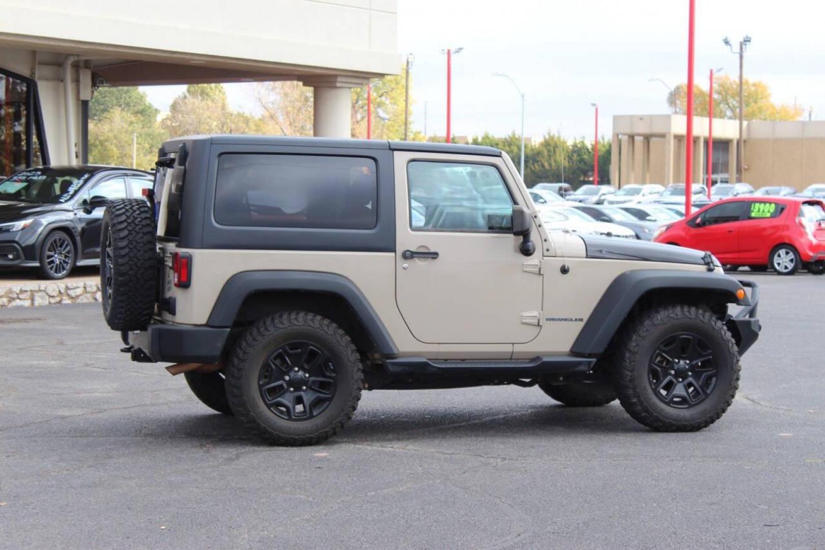 2016 Tan Jeep Wrangler Sport 4WD (1C4AJWAG7GL) with an 3.6L V6 DOHC 24V FFV engine, Automatic 5-Speed transmission, located at 4301 NW 39th , Oklahoma City, OK, 73112, (405) 949-5600, 35.512135, -97.598671 - NO DRIVERS LICENCE -NO FULL COVERAGE INSURANCE - NO CREDIT CHECK. COME ON OVER TO SUPERSPORTS, TAKE A LOOK AND TEST DRIVE. PLEASE GIVE US A CALL AT (405) 949-5600. NO LICENCIA DE CONDUCIR - NO SEGURO DE COBERTURA TOTAL - NO VERIFICACION DE CREDITO. VISITENOS EN SUPERSPORTS, MIRE NUESTRO - Photo#2