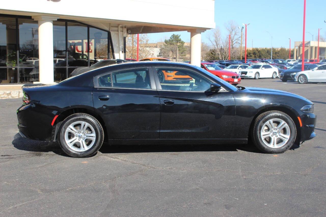2023 Black Dodge Charger SXT (2C3CDXBG5PH) with an 3.6L V6 DOHC 24V engine, 8A transmission, located at 4301 NW 39th , Oklahoma City, OK, 73112, (405) 949-5600, 35.512135, -97.598671 - NO DRIVERS LICENCE -NO FULL COVERAGE INSURANCE - NO CREDIT CHECK. COME ON OVER TO SUPERSPORTS, TAKE A LOOK AND TEST DRIVE. PLEASE GIVE US A CALL AT (405) 949-5600. NO LICENCIA DE CONDUCIR - NO SEGURO DE COBERTURA TOTAL - NO VERIFICACION DE CREDITO. VISITENOS EN SUPERSPORTS, MIRE NUESTRO - Photo#2