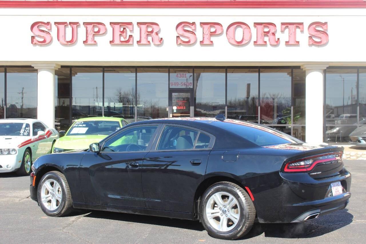2023 Black Dodge Charger SXT (2C3CDXBG5PH) with an 3.6L V6 3.6L V6 engine, Automatic 8-Speed transmission, located at 4301 NW 39th , Oklahoma City, OK, 73112, (405) 949-5600, 35.512135, -97.598671 - Hablamos espanol. SPEND SMART --- BUY FROM SUPER SPORTS. ALL PRICES, DOWN PAYMENTS, PAYMENTS, AND FINANCE TERMS ARE NEGOTIABLE AT THE TIME OF APPROVAL. WE WILL WORK WITH YOU TO FIT YOUR BUDGET. WE WILL EVEN LOWER AND ADJUST THE NUMBERS TO HELP MAKE THE VE HICLE MORE AFFORDABLE FOR YOU.- Photo#4