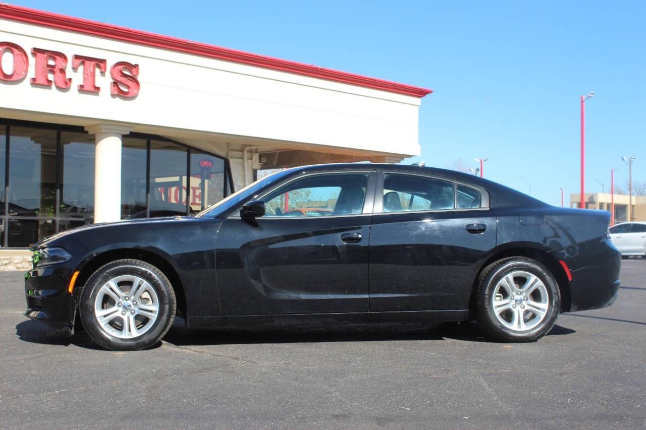 2023 Black Dodge Charger SXT (2C3CDXBG5PH) with an 3.6L V6 3.6L V6 engine, Automatic 8-Speed transmission, located at 4301 NW 39th , Oklahoma City, OK, 73112, (405) 949-5600, 35.512135, -97.598671 - Hablamos espanol. SPEND SMART --- BUY FROM SUPER SPORTS. ALL PRICES, DOWN PAYMENTS, PAYMENTS, AND FINANCE TERMS ARE NEGOTIABLE AT THE TIME OF APPROVAL. WE WILL WORK WITH YOU TO FIT YOUR BUDGET. WE WILL EVEN LOWER AND ADJUST THE NUMBERS TO HELP MAKE THE VE HICLE MORE AFFORDABLE FOR YOU.- Photo#5