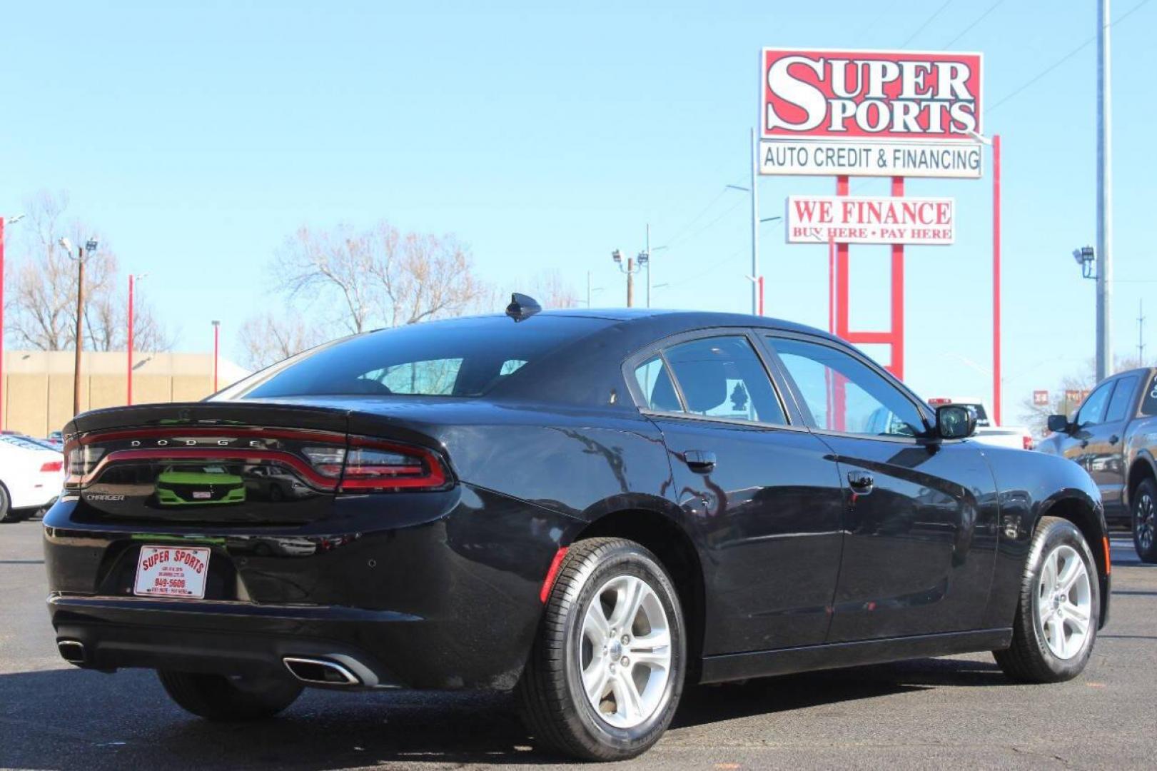 2023 Black Dodge Charger SXT (2C3CDXBG5PH) with an 3.6L V6 DOHC 24V engine, 8A transmission, located at 4301 NW 39th , Oklahoma City, OK, 73112, (405) 949-5600, 35.512135, -97.598671 - NO DRIVERS LICENCE NO-FULL COVERAGE INSURANCE-NO CREDIT CHECK. COME ON OVER TO SUPERSPORTS AND TAKE A LOOK AND TEST DRIVE. PLEASE GIVE US A CALL AT (405) 949-5600. NO LICENSIA DE MANEJAR- NO SEGURO DE COBERTURA TOTAL- NO VERIFICACCION DE CREDITO. POR FAVOR VENGAN A SUPERSPORTS, ECHE UN - Photo#4