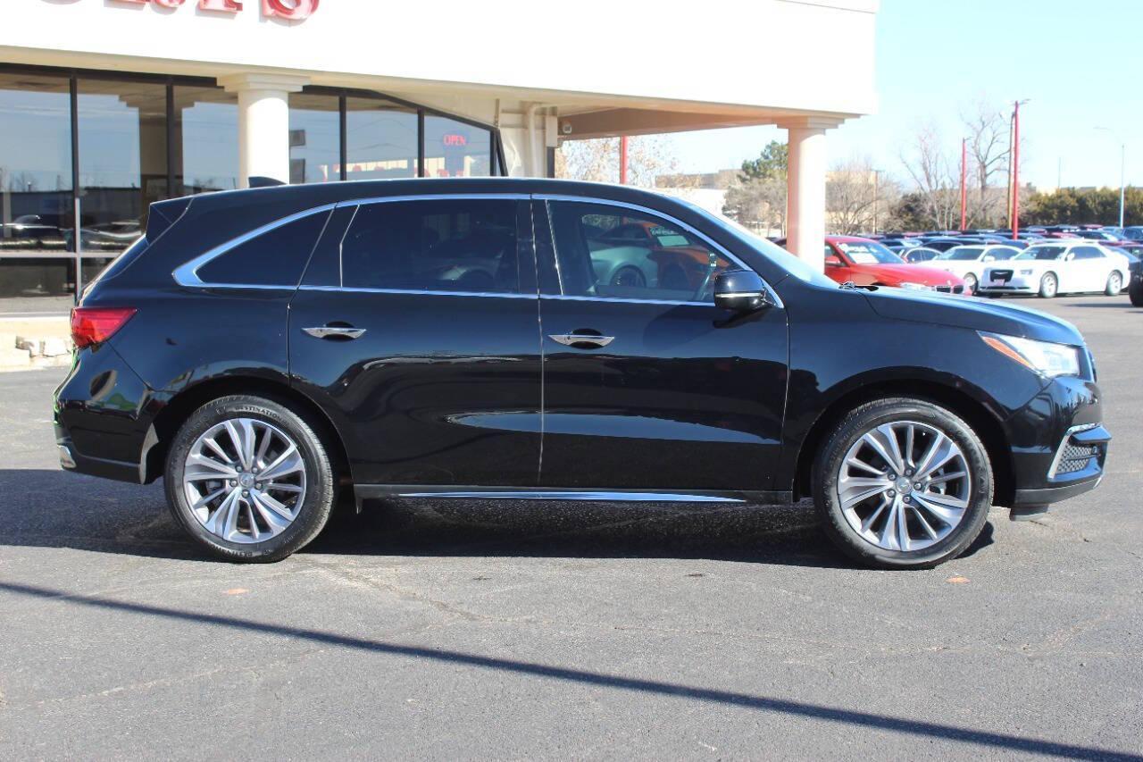2018 Black Acura MDX SH-AWD 9-Spd AT w/Tech Package (5J8YD4H52JL) with an 3.5L V6 3.5L V6 engine, Automatic 9-Speed transmission, located at 4301 NW 39th , Oklahoma City, OK, 73112, (405) 949-5600, 35.512135, -97.598671 - NO DRIVERS LICENCE NO-FULL COVERAGE INSURANCE-NO CREDIT CHECK. COME ON OVER TO SUPERSPORTS AND TAKE A LOOK AND TEST DRIVE. PLEASE GIVE US A CALL AT (405) 949-5600. NO LICENSIA DE MANEJAR- NO SEGURO DE COBERTURA TOTAL- NO VERIFICACCION DE CREDITO. POR FAVOR VENGAN A SUPERSPORTS, ECHE UN - Photo#2