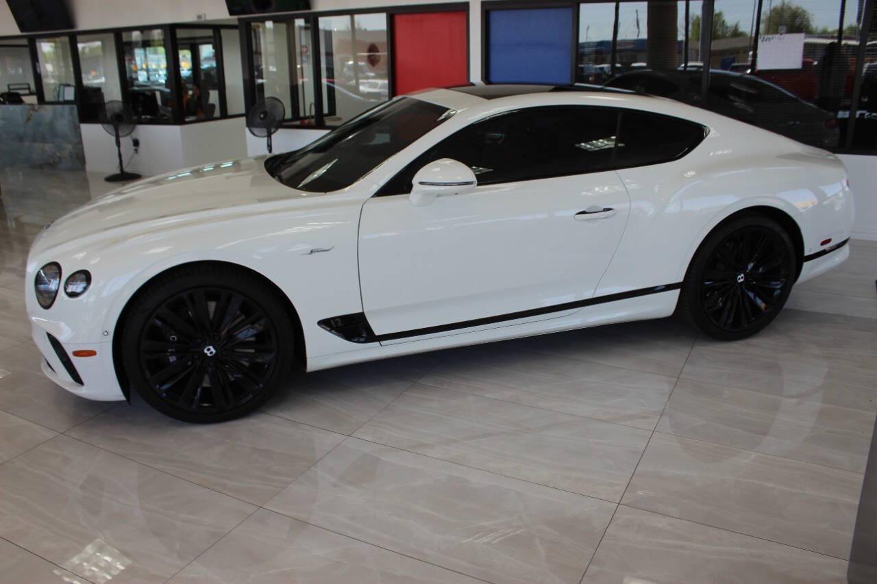 2023 White Bentley Continental GT Speed Coupe (SCBCT2ZG7PC) with an 4.0L V8 DOHC 32V engine, 8A transmission, located at 4301 NW 39th , Oklahoma City, OK, 73112, (405) 949-5600, 35.512135, -97.598671 - PERSONAL VEHICLE LAST FEW YEARS. it's one of a wife's few possessions that are considered toys looks and drives brand new its a must see. My name is Josh, and I own dealerships and finance companies here in Oklahoma. I have 27 years of experience buying and selling all makes and models of vehi - Photo#4