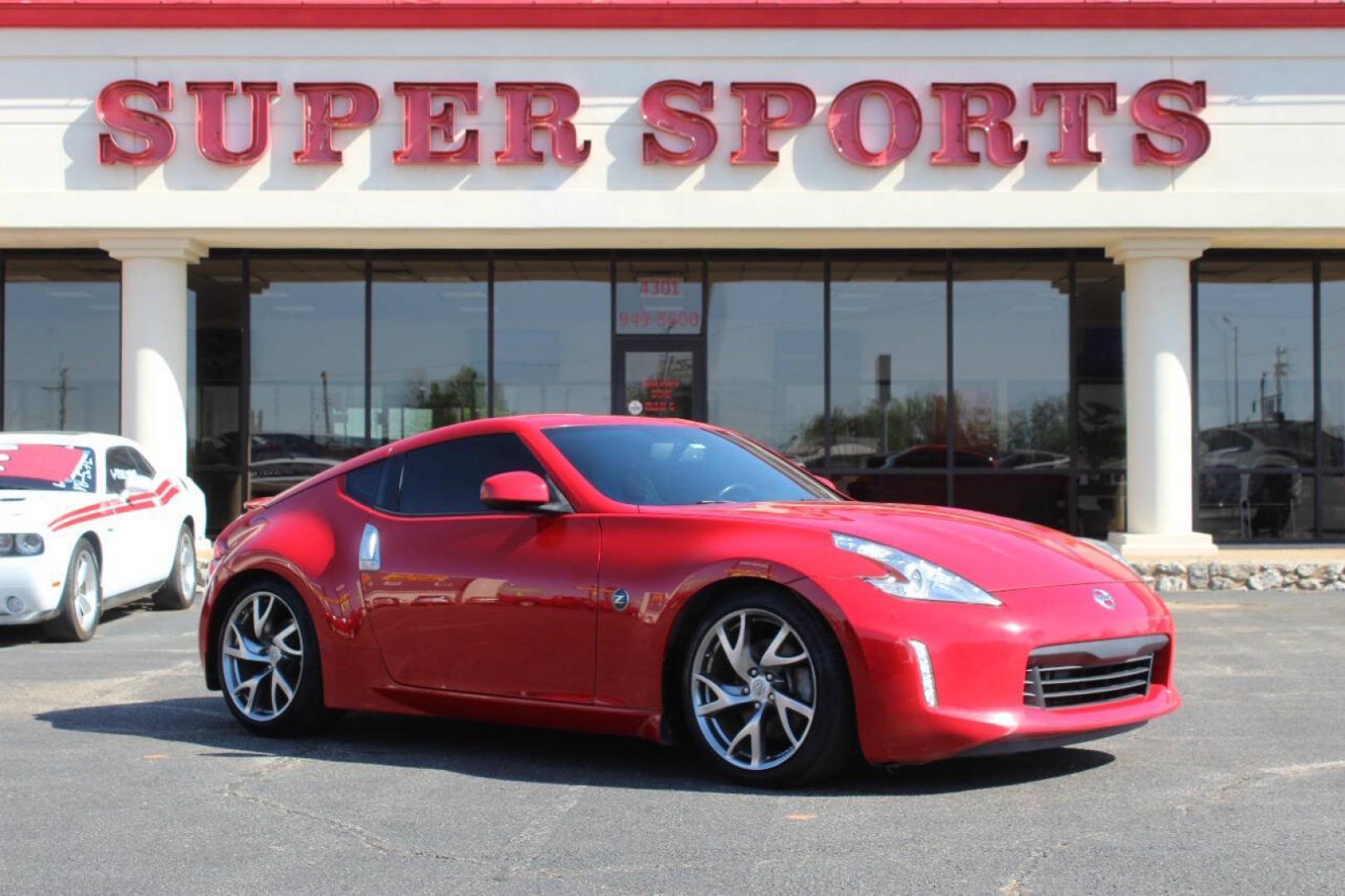 2015 Red Nissan 370Z 370Z Coupe Touring 6MT (JN1AZ4EH4FM) with an 3.7L V6 3.7L V6 engine, Automatic 7-Speed transmission, located at 4301 NW 39th , Oklahoma City, OK, 73112, (405) 949-5600, 35.512135, -97.598671- Photo#0