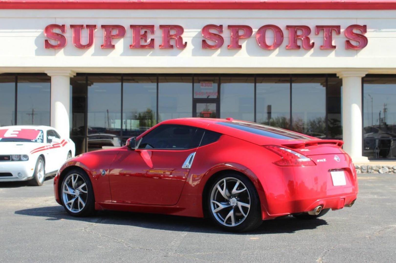 2015 Red Nissan 370Z 370Z Coupe Touring 6MT (JN1AZ4EH4FM) with an 3.7L V6 3.7L V6 engine, Automatic 7-Speed transmission, located at 4301 NW 39th , Oklahoma City, OK, 73112, (405) 949-5600, 35.512135, -97.598671- Photo#4