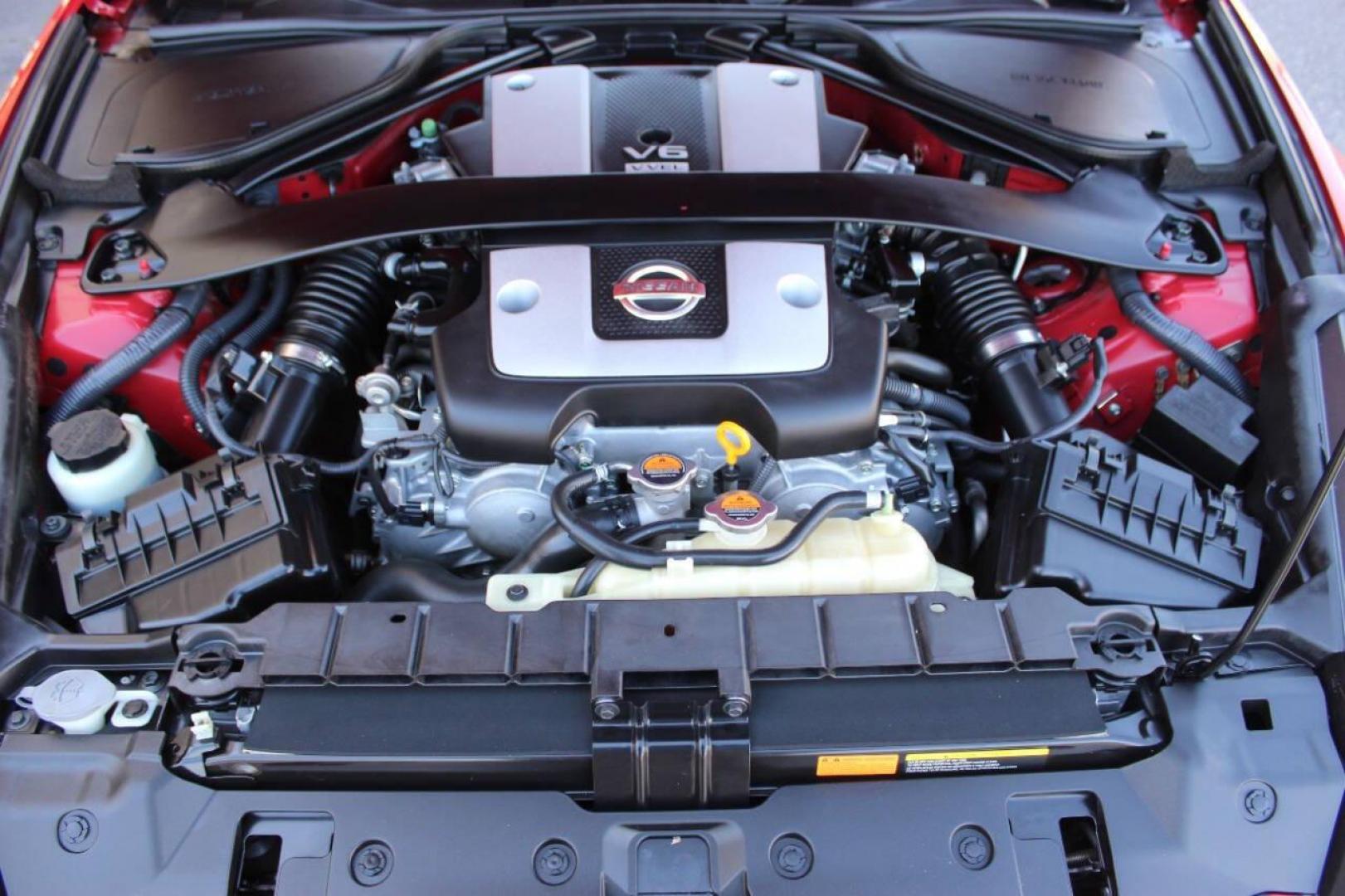2015 Red Nissan 370Z 370Z Coupe Touring 6MT (JN1AZ4EH4FM) with an 3.7L V6 3.7L V6 engine, Automatic 7-Speed transmission, located at 4301 NW 39th , Oklahoma City, OK, 73112, (405) 949-5600, 35.512135, -97.598671- Photo#7