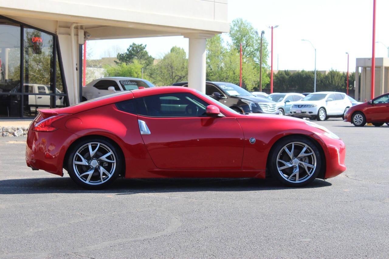 2015 Red Nissan Z 370Z Coupe Touring 6MT (JN1AZ4EH4FM) with an 3.7L V6 DOHC 24V engine, 6-Speed Manual transmission, located at 4301 NW 39th , Oklahoma City, OK, 73112, (405) 949-5600, 35.512135, -97.598671 - NO DRIVERS LICENCE -NO FULL COVERAGE INSURANCE - NO CREDIT CHECK. COME ON OVER TO SUPERSPORTS, TAKE A LOOK AND TEST DRIVE. PLEASE GIVE US A CALL AT (405) 949-5600. NO LICENCIA DE CONDUCIR - NO SEGURO DE COBERTURA TOTAL - NO VERIFICACION DE CREDITO. VISITENOS EN SUPERSPORTS, MIRE NUESTRO - Photo#2