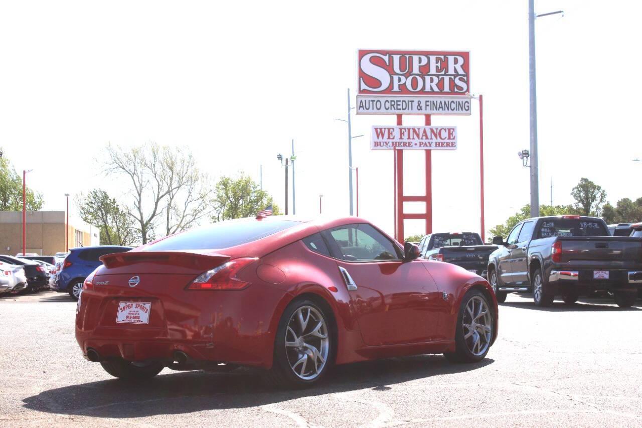 2015 Red Nissan Z 370Z Coupe Touring 6MT (JN1AZ4EH4FM) with an 3.7L V6 DOHC 24V engine, 6-Speed Manual transmission, located at 4301 NW 39th , Oklahoma City, OK, 73112, (405) 949-5600, 35.512135, -97.598671 - NO DRIVERS LICENCE -NO FULL COVERAGE INSURANCE - NO CREDIT CHECK. COME ON OVER TO SUPERSPORTS, TAKE A LOOK AND TEST DRIVE. PLEASE GIVE US A CALL AT (405) 949-5600. NO LICENCIA DE CONDUCIR - NO SEGURO DE COBERTURA TOTAL - NO VERIFICACION DE CREDITO. VISITENOS EN SUPERSPORTS, MIRE NUESTRO - Photo#3