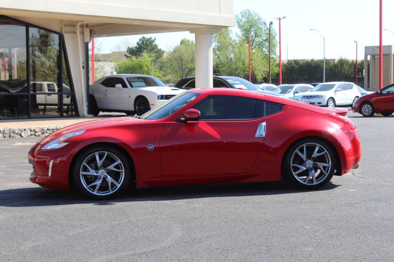 2015 Red Nissan Z 370Z Coupe Touring 6MT (JN1AZ4EH4FM) with an 3.7L V6 DOHC 24V engine, 6-Speed Manual transmission, located at 4301 NW 39th , Oklahoma City, OK, 73112, (405) 949-5600, 35.512135, -97.598671 - NO DRIVERS LICENCE -NO FULL COVERAGE INSURANCE - NO CREDIT CHECK. COME ON OVER TO SUPERSPORTS, TAKE A LOOK AND TEST DRIVE. PLEASE GIVE US A CALL AT (405) 949-5600. NO LICENCIA DE CONDUCIR - NO SEGURO DE COBERTURA TOTAL - NO VERIFICACION DE CREDITO. VISITENOS EN SUPERSPORTS, MIRE NUESTRO - Photo#5