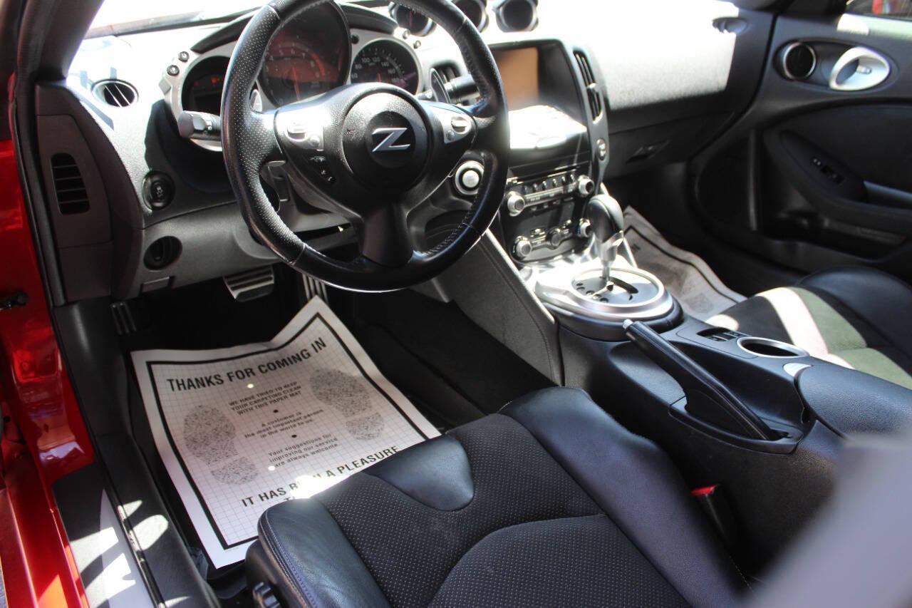 2015 Red Nissan Z 370Z Coupe Touring 6MT (JN1AZ4EH4FM) with an 3.7L V6 DOHC 24V engine, 6-Speed Manual transmission, located at 4301 NW 39th , Oklahoma City, OK, 73112, (405) 949-5600, 35.512135, -97.598671 - NO DRIVERS LICENCE -NO FULL COVERAGE INSURANCE - NO CREDIT CHECK. COME ON OVER TO SUPERSPORTS, TAKE A LOOK AND TEST DRIVE. PLEASE GIVE US A CALL AT (405) 949-5600. NO LICENCIA DE CONDUCIR - NO SEGURO DE COBERTURA TOTAL - NO VERIFICACION DE CREDITO. VISITENOS EN SUPERSPORTS, MIRE NUESTRO - Photo#10