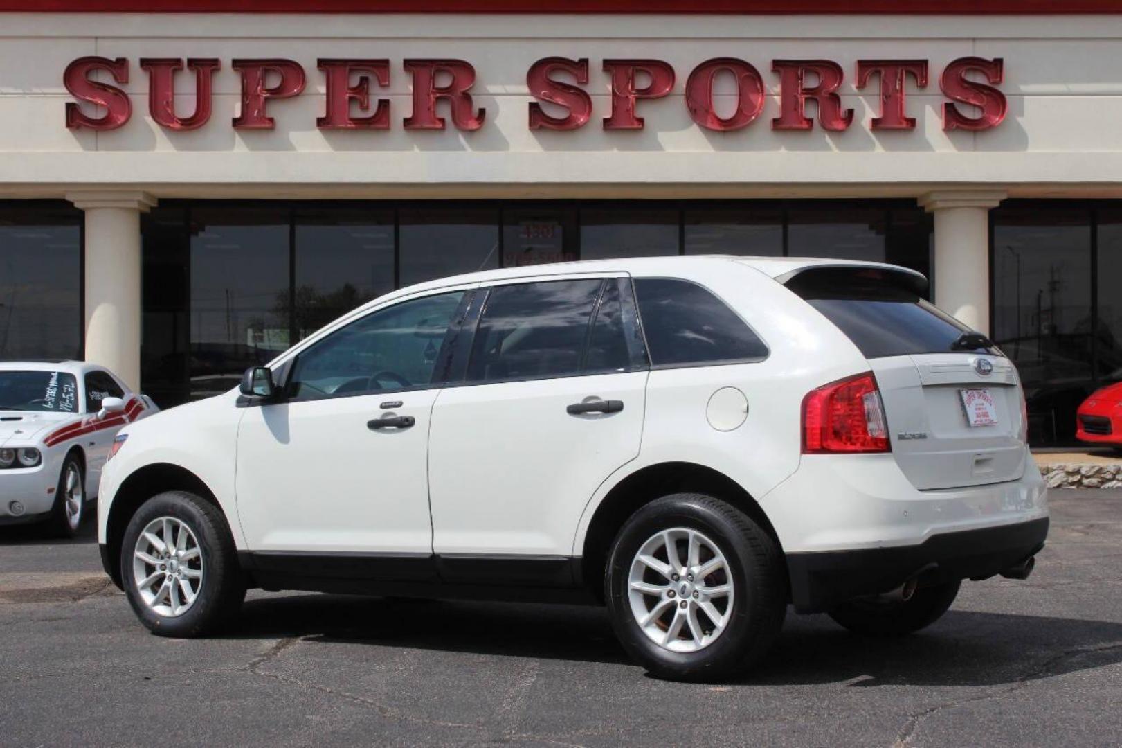 2013 White Ford Edge SE FWD (2FMDK3GC8DB) with an 3.5L V6 DOHC 24V engine, 6-Speed Automatic transmission, located at 4301 NW 39th , Oklahoma City, OK, 73112, (405) 949-5600, 35.512135, -97.598671 - NO DRIVERS LICENCE NO-FULL COVERAGE INSURANCE-NO CREDIT CHECK. COME ON OVER TO SUPERSPORTS AND TAKE A LOOK AND TEST DRIVE. PLEASE GIVE US A CALL AT (405) 949-5600. NO LICENSIA DE MANEJAR- NO SEGURO DE COBERTURA TOTAL- NO VERIFICACCION DE CREDITO. POR FAVOR VENGAN A SUPERSPORTS, - Photo#5