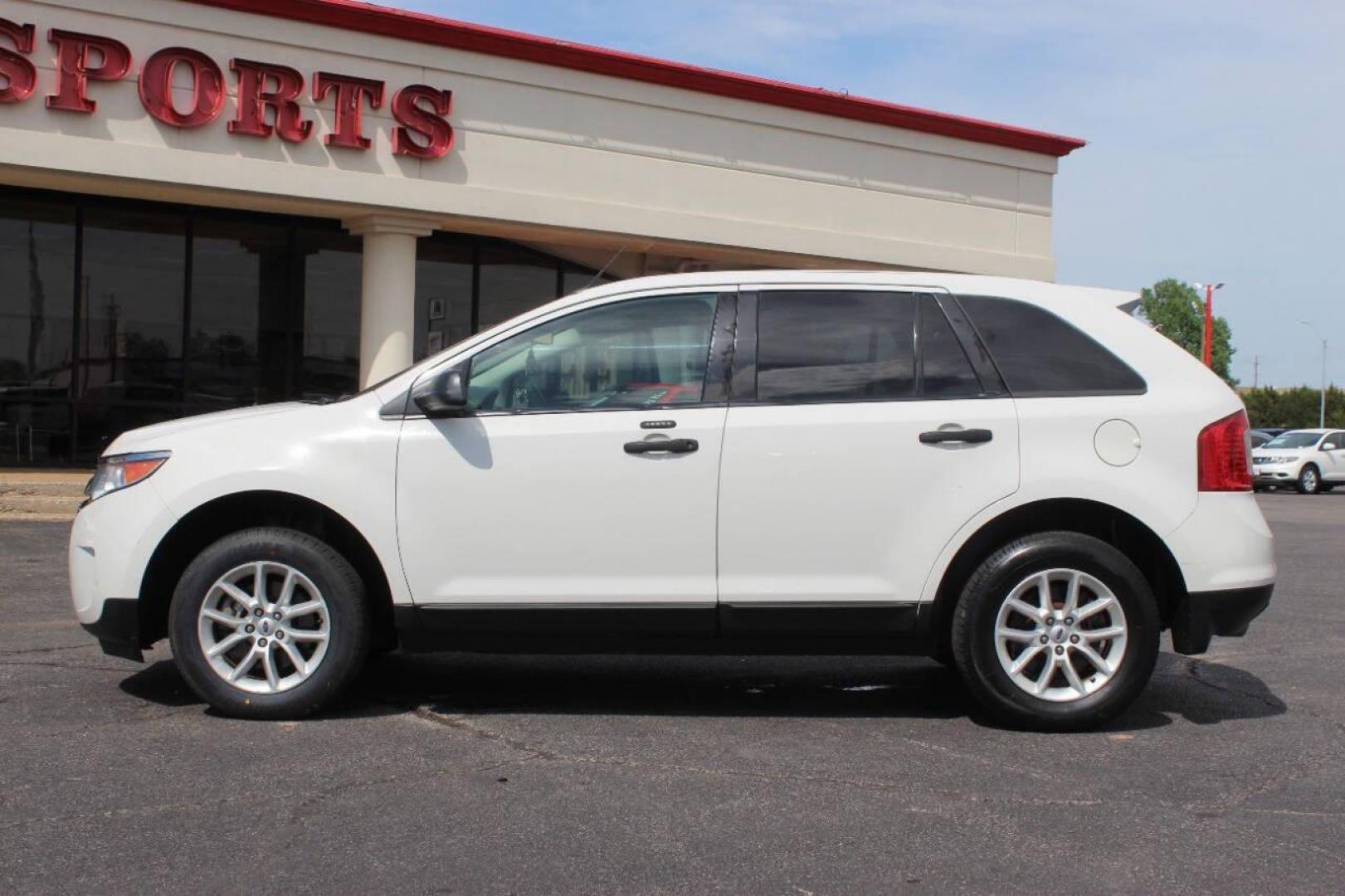 2013 White Ford Edge SE FWD (2FMDK3GC8DB) with an 3.5L V6 DOHC 24V engine, 6-Speed Automatic transmission, located at 4301 NW 39th , Oklahoma City, OK, 73112, (405) 949-5600, 35.512135, -97.598671 - NO DRIVERS LICENCE NO-FULL COVERAGE INSURANCE-NO CREDIT CHECK. COME ON OVER TO SUPERSPORTS AND TAKE A LOOK AND TEST DRIVE. PLEASE GIVE US A CALL AT (405) 949-5600. NO LICENSIA DE MANEJAR- NO SEGURO DE COBERTURA TOTAL- NO VERIFICACCION DE CREDITO. POR FAVOR VENGAN A SUPERSPORTS, - Photo#6