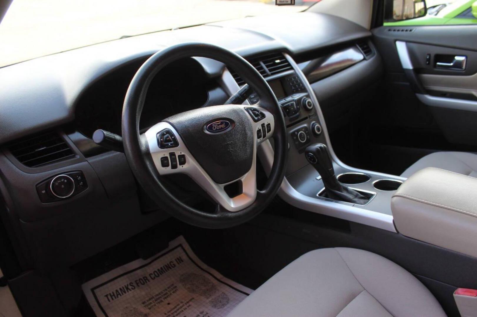 2013 White Ford Edge SE FWD (2FMDK3GC8DB) with an 3.5L V6 DOHC 24V engine, 6-Speed Automatic transmission, located at 4301 NW 39th , Oklahoma City, OK, 73112, (405) 949-5600, 35.512135, -97.598671 - NO DRIVERS LICENCE NO-FULL COVERAGE INSURANCE-NO CREDIT CHECK. COME ON OVER TO SUPERSPORTS AND TAKE A LOOK AND TEST DRIVE. PLEASE GIVE US A CALL AT (405) 949-5600. NO LICENSIA DE MANEJAR- NO SEGURO DE COBERTURA TOTAL- NO VERIFICACCION DE CREDITO. POR FAVOR VENGAN A SUPERSPORTS, - Photo#16