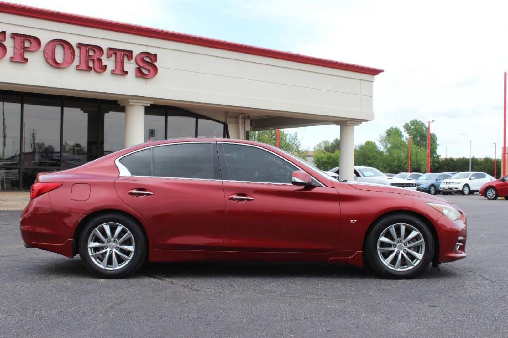 2014 Burgundy Infiniti Q50 Premium (JN1BV7AP2EM) with an 3.7L V6 DOHC 24V HYBRID engine, 7-Speed Automatic transmission, located at 4301 NW 39th , Oklahoma City, OK, 73112, (405) 949-5600, 35.512135, -97.598671 - NO DRIVERS LICENCE NO-FULL COVERAGE INSURANCE-NO CREDIT CHECK. COME ON OVER TO SUPERSPORTS AND TAKE A LOOK AND TEST DRIVE. PLEASE GIVE US A CALL AT (405) 949-5600. NO LICENSIA DE MANEJAR- NO SEGURO DE COBERTURA TOTAL- NO VERIFICACCION DE CREDITO. POR FAVOR VENGAN A SUPERSPORTS, ECHE UN - Photo#3
