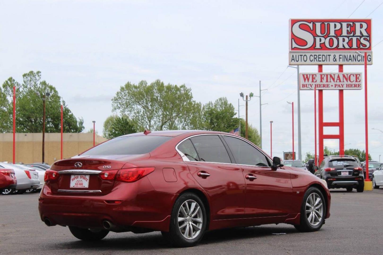 2014 Burgundy Infiniti Q50 Premium (JN1BV7AP2EM) with an 3.7L V6 DOHC 24V HYBRID engine, 7-Speed Automatic transmission, located at 4301 NW 39th , Oklahoma City, OK, 73112, (405) 949-5600, 35.512135, -97.598671 - NO DRIVERS LICENCE NO-FULL COVERAGE INSURANCE-NO CREDIT CHECK. COME ON OVER TO SUPERSPORTS AND TAKE A LOOK AND TEST DRIVE. PLEASE GIVE US A CALL AT (405) 949-5600. NO LICENSIA DE MANEJAR- NO SEGURO DE COBERTURA TOTAL- NO VERIFICACCION DE CREDITO. POR FAVOR VENGAN A SUPERSPORTS, ECHE UN - Photo#4