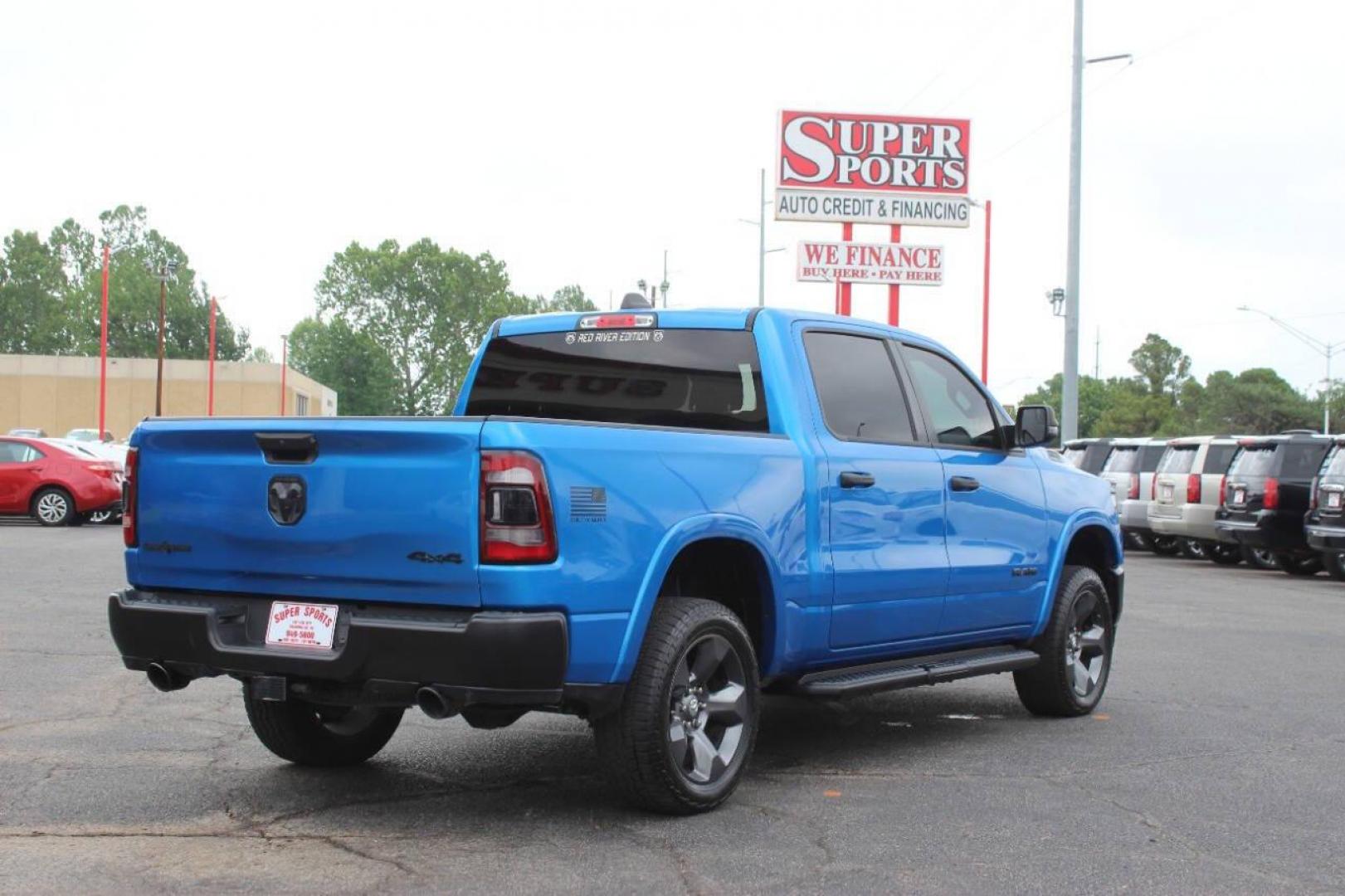2023 Blue RAM 1500 Big Horn Crew Cab SWB 4WD (1C6SRFFT1PN) with an 5.7L V8 OHV 16V engine, 8A transmission, located at 4301 NW 39th , Oklahoma City, OK, 73112, (405) 949-5600, 35.512135, -97.598671 - NO DRIVERS LICENCE NO - FULL COVERAGE INSURANCE - NO CREDIT CHECK. COME ON OVER TO SUPERSPORTS AND TAKE A LOOK AND TEST DRIVE . PLEASE GIVE US A CALL AT (405) 949-5600. NO LICENCIA DE MANEJAR - NO SEGURO DE COBERTURA TOTAL - NO VERIFICACION DE CREDITO. POR FAVOR VENGAN A SUPERSPORTS, EC - Photo#4