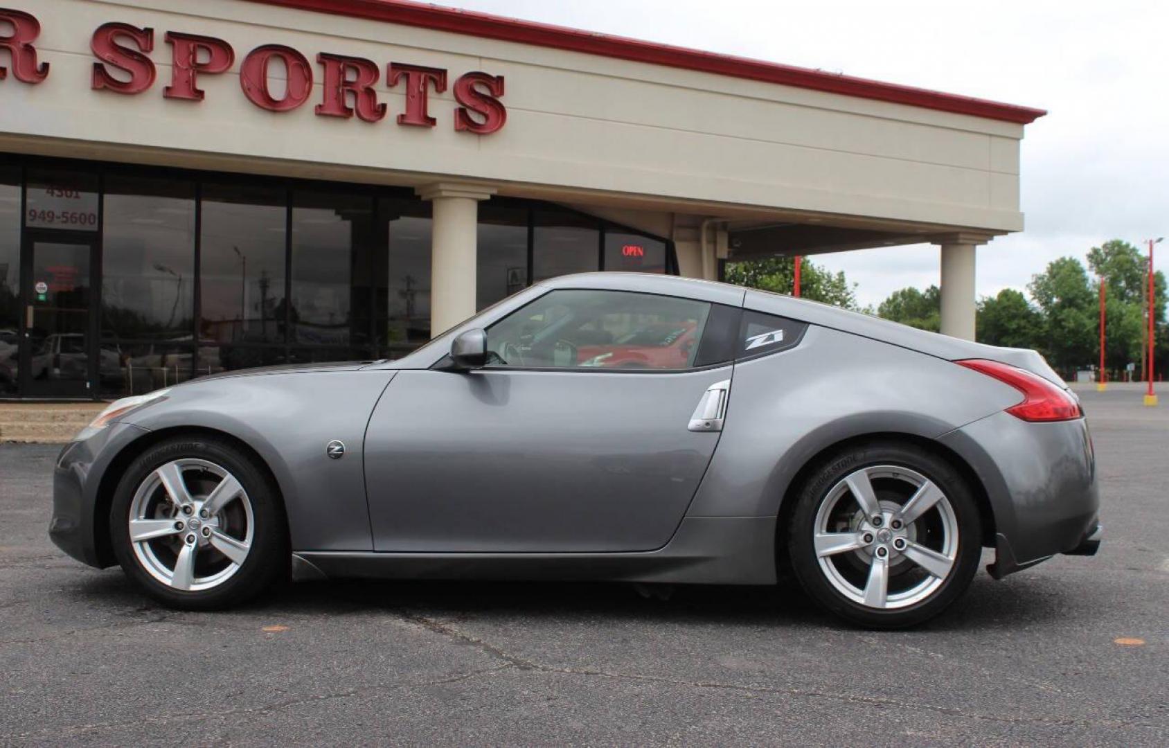 2011 Gray Nissan Z 370Z Coupe (JN1AZ4EHXBM) with an 3.7L V6 DOHC 24V engine, Automatic 7-Speed transmission, located at 4301 NW 39th , Oklahoma City, OK, 73112, (405) 949-5600, 35.512135, -97.598671 - NO DRIVERS LICENCE NO-FULL COVERAGE INSURANCE-NO CREDIT CHECK. COME ON OVER TO SUPERSPORTS AND TAKE A LOOK AND TEST DRIVE PLEASE GIVE US A CALL AT (405) 949-5600. NO LICENSIA DE MANEJAR- NO SEGURO DE COBERTURA TOTAL- NO VERIFICACCION DE CREDITO. POR FAVOR VENGAN A SUPERSPORTS, ECHE UN VIS - Photo#6
