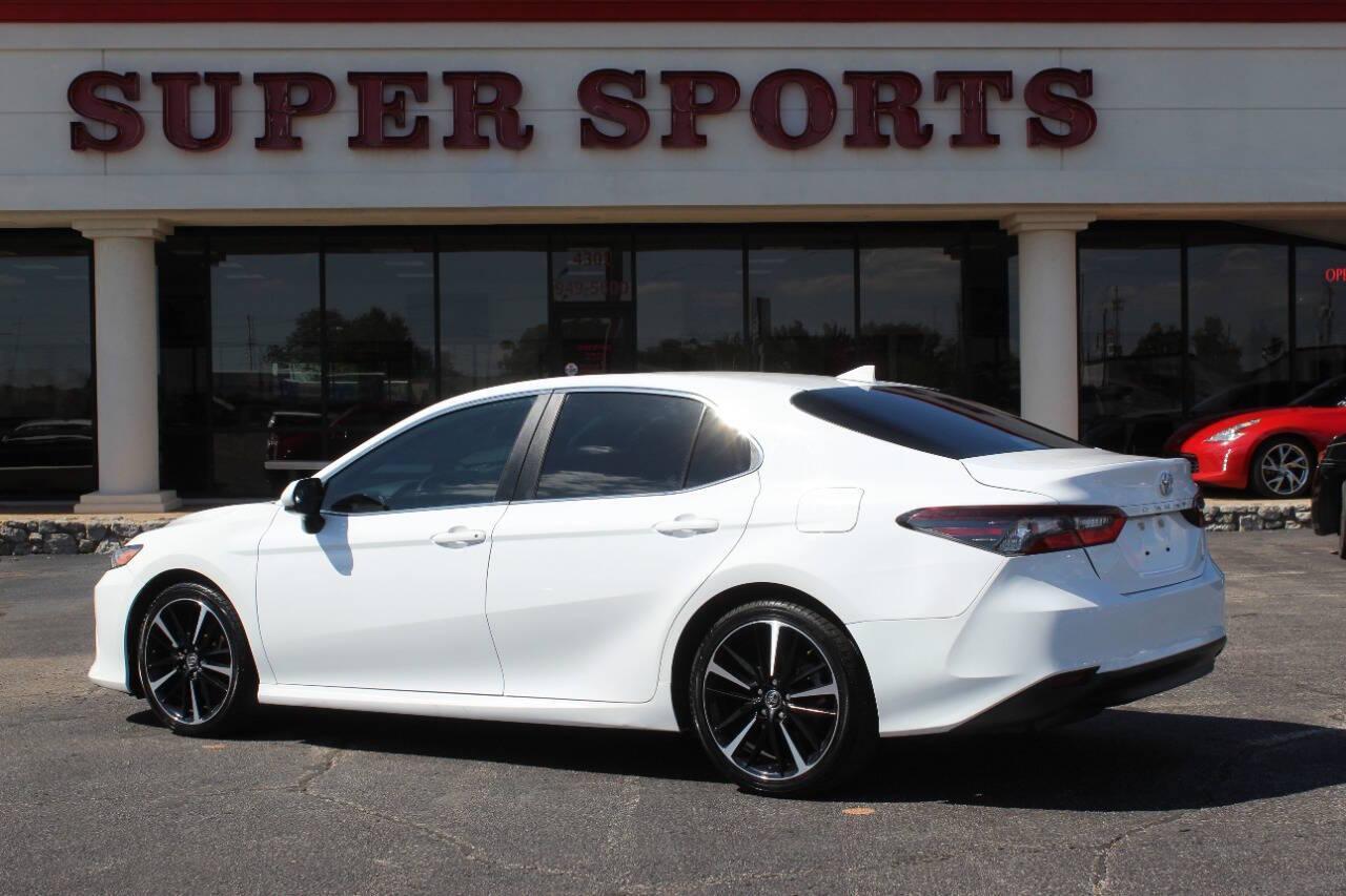 2021 White Toyota Camry LE (4T1C11AK9MU) with an 2.5L L4 DOHC 16V engine, 8A transmission, located at 4301 NW 39th , Oklahoma City, OK, 73112, (405) 949-5600, 35.512135, -97.598671 - NO DRIVERS LICENCE -NO FULL COVERAGE INSURANCE - NO CREDIT CHECK. COME ON OVER TO SUPERSPORTS, TAKE A LOOK AND TEST DRIVE. PLEASE GIVE US A CALL AT (405) 949-5600. NO LICENCIA DE CONDUCIR - NO SEGURO DE COBERTURA TOTAL - NO VERIFICACION DE CREDITO. VISITENOS EN SUPERSPORTS, MIRE NUESTRO - Photo#4