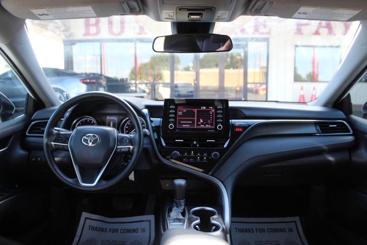 2021 White Toyota Camry LE (4T1C11AK9MU) with an 2.5L L4 DOHC 16V engine, 8A transmission, located at 4301 NW 39th , Oklahoma City, OK, 73112, (405) 949-5600, 35.512135, -97.598671 - NO DRIVERS LICENCE -NO FULL COVERAGE INSURANCE - NO CREDIT CHECK. COME ON OVER TO SUPERSPORTS, TAKE A LOOK AND TEST DRIVE. PLEASE GIVE US A CALL AT (405) 949-5600. NO LICENCIA DE CONDUCIR - NO SEGURO DE COBERTURA TOTAL - NO VERIFICACION DE CREDITO. VISITENOS EN SUPERSPORTS, MIRE NUESTRO - Photo#17