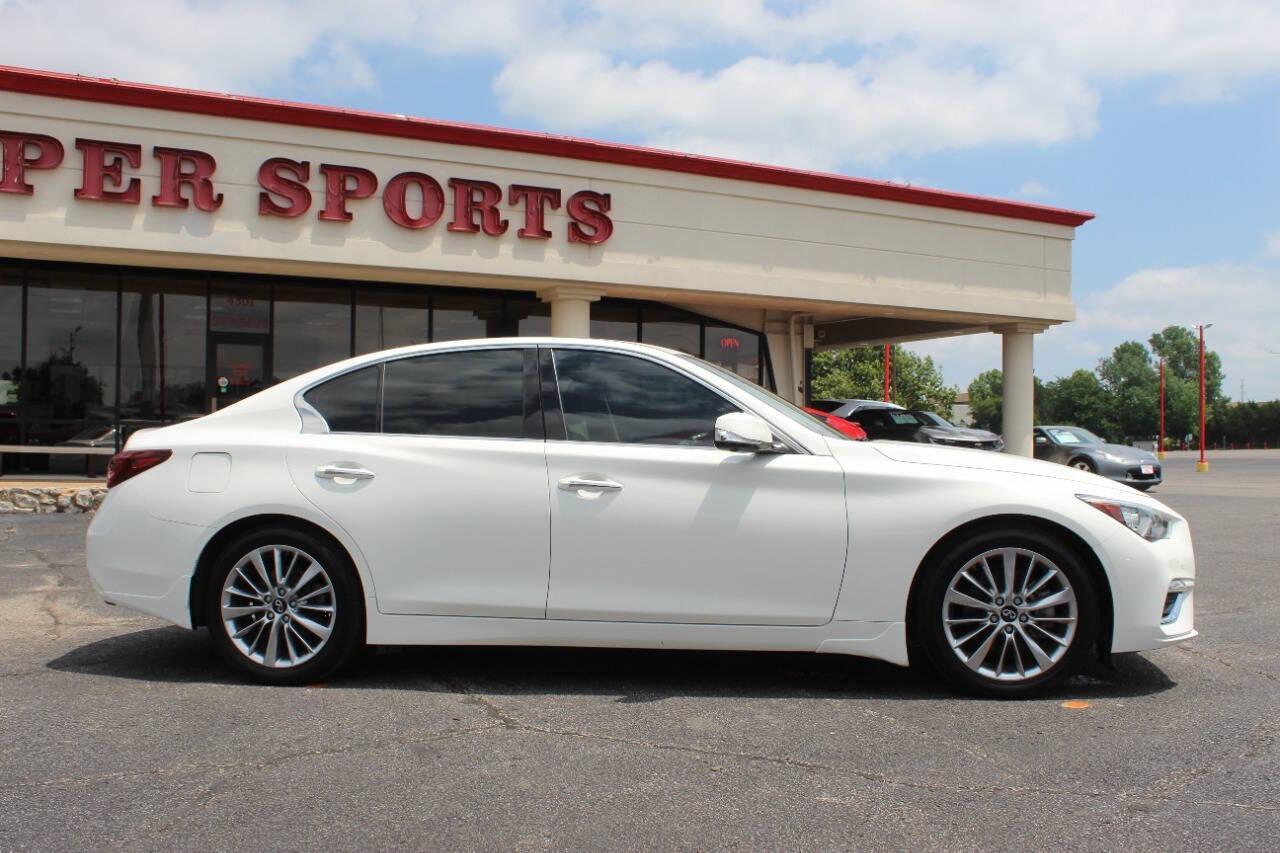 2021 White Infiniti Q50 3.0t Luxe (JN1EV7BP9MM) with an 3.0L V6 DOHC 24V TURBO engine, 7A transmission, located at 4301 NW 39th , Oklahoma City, OK, 73112, (405) 949-5600, 35.512135, -97.598671 - NO DRIVERS LICENCE -NO FULL COVERAGE INSURANCE- NO CREDIT CHECK. COME ON OVER TO SUPERSPORTS, TAKE A LOOK AND TEST DRIVE. PLEASE GIVE US A CALL AT (405) 949-5600. NO LICENCIA DE CONDUCIR - NO SEGURO DE COBERTURA TOTAL - NO VERIFICACION DE CREDITO. VISITENOS EN SUPERSPORTS, MIRE NUESTRO - Photo#2