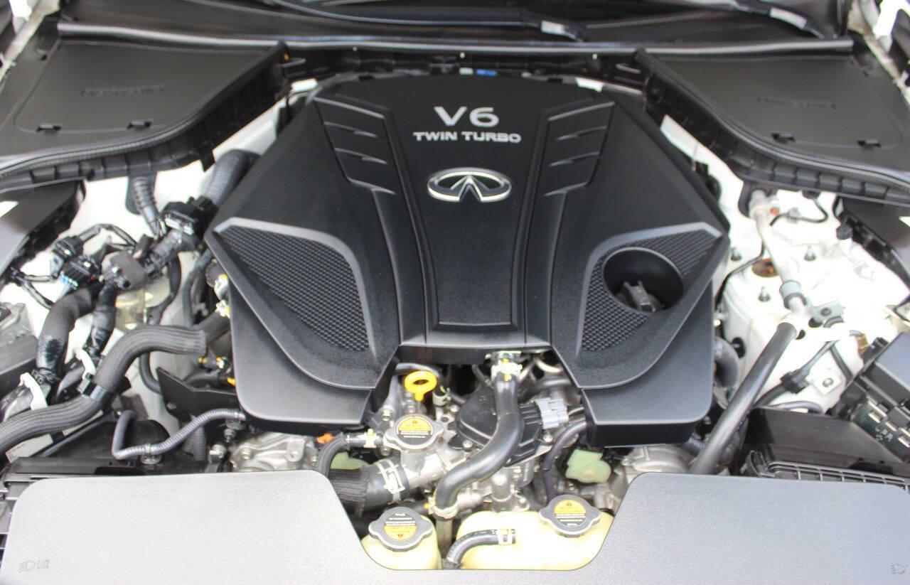 2021 White Infiniti Q50 3.0t Luxe (JN1EV7BP9MM) with an 3.0L V6 DOHC 24V TURBO engine, 7A transmission, located at 4301 NW 39th , Oklahoma City, OK, 73112, (405) 949-5600, 35.512135, -97.598671 - NO DRIVERS LICENCE -NO FULL COVERAGE INSURANCE- NO CREDIT CHECK. COME ON OVER TO SUPERSPORTS, TAKE A LOOK AND TEST DRIVE. PLEASE GIVE US A CALL AT (405) 949-5600. NO LICENCIA DE CONDUCIR - NO SEGURO DE COBERTURA TOTAL - NO VERIFICACION DE CREDITO. VISITENOS EN SUPERSPORTS, MIRE NUESTRO - Photo#4