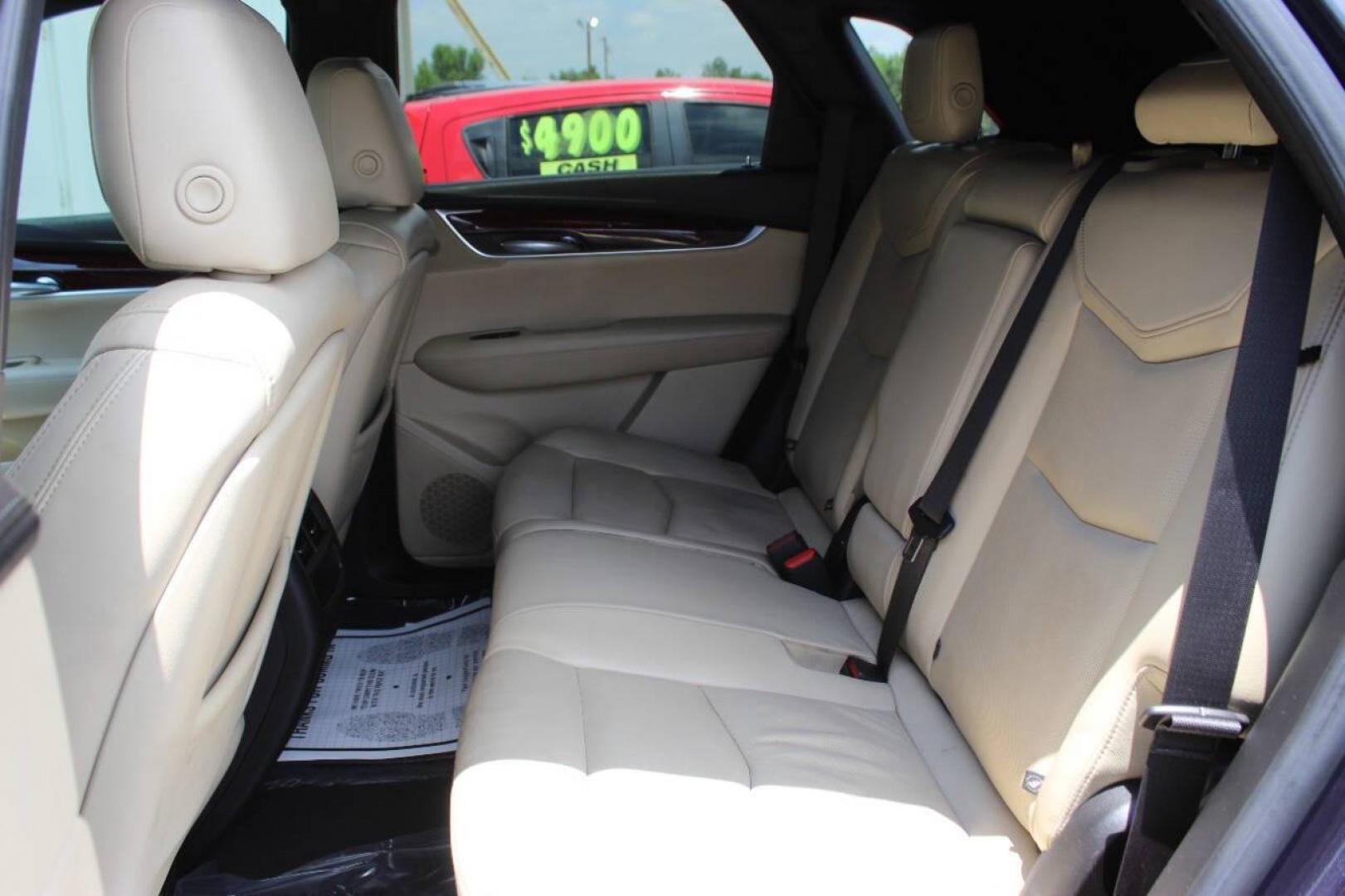 2018 Blue Cadillac XT5 Luxury (1GYKNCRS4JZ) with an 3.6L V6 DOHC 24V engine, 8A transmission, located at 4301 NW 39th , Oklahoma City, OK, 73112, (405) 949-5600, 35.512135, -97.598671 - NO DRIVERS LICENCE NO-FULL COVERAGE INSURANCE-NO CREDIT CHECK. COME ON OVER TO SUPERSPORTS AND TAKE A LOOK AND TEST DRIVE. PLEASE GIVE US A CALL AT (405) 949-5600. NO LICENSIA DE MANEJAR- NO SEGURO DE COBERTURA TOTAL- NO VERIFICACCION DE CREDITO. POR FAVOR VENGAN A SUPERSPORTS, ECHE UN - Photo#14